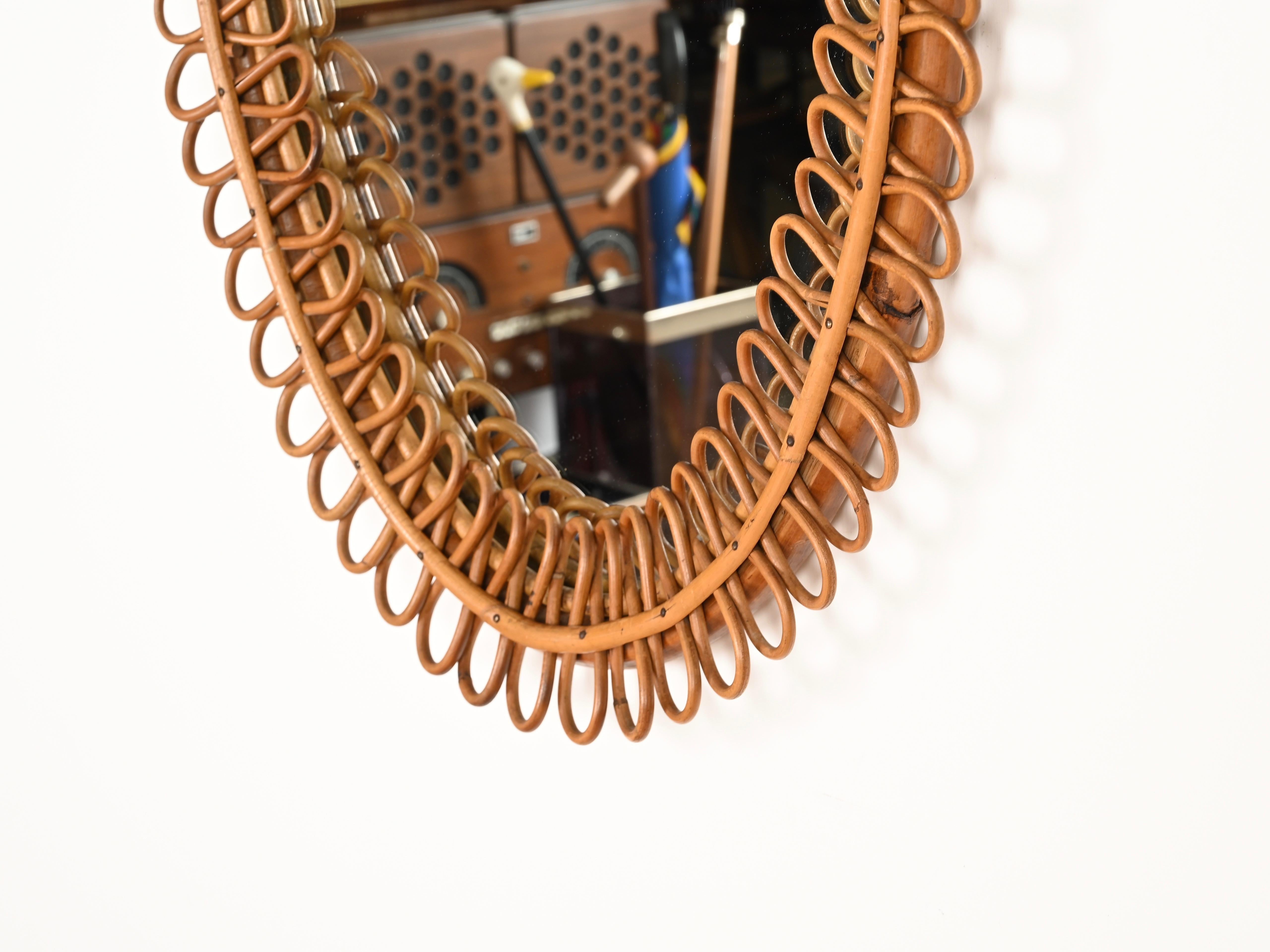 Metà XX secolo Franco Albini Grande specchio ovale in rattan curvato e bambù, Italia 1960s in vendita