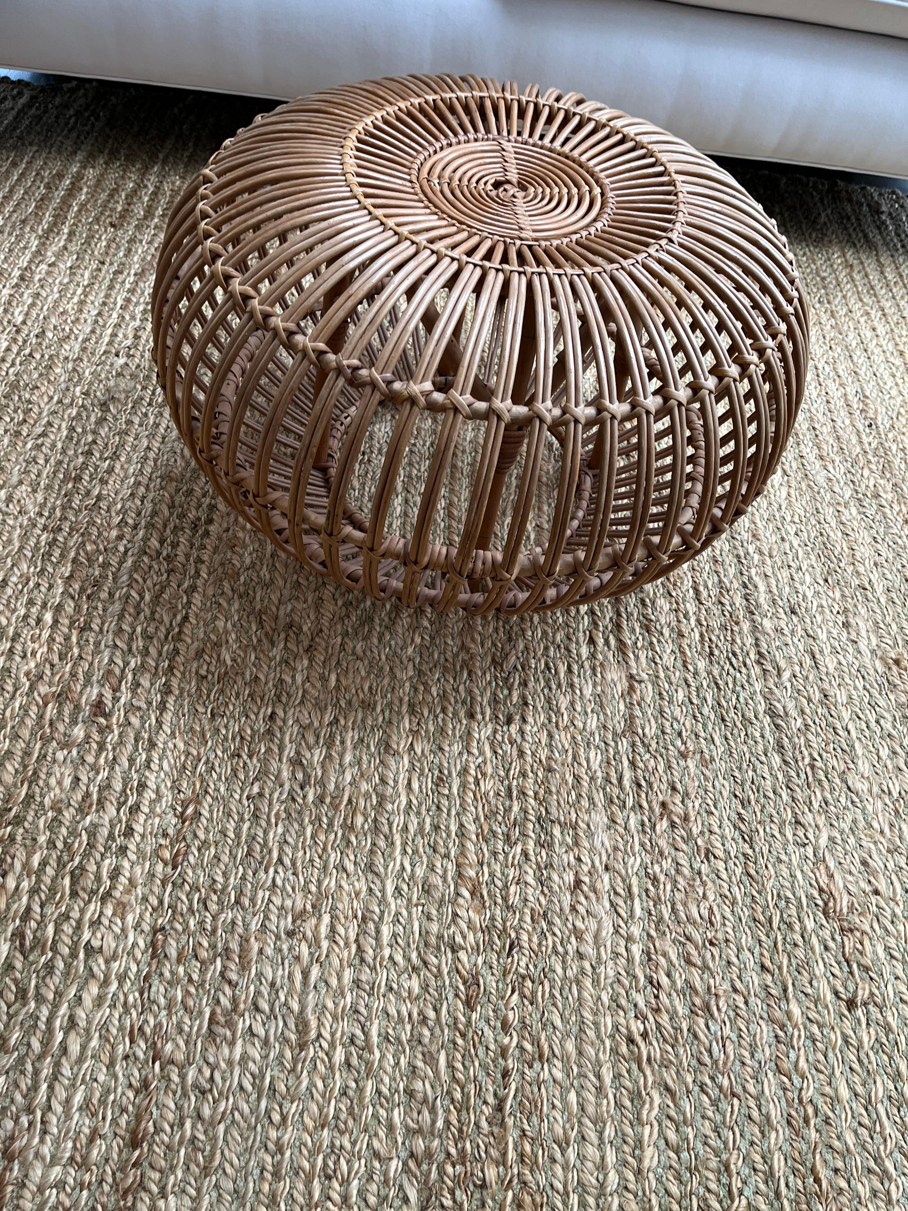 A Mid-Century Modern woven rattan pouf by Franco Albini in excellent condition.