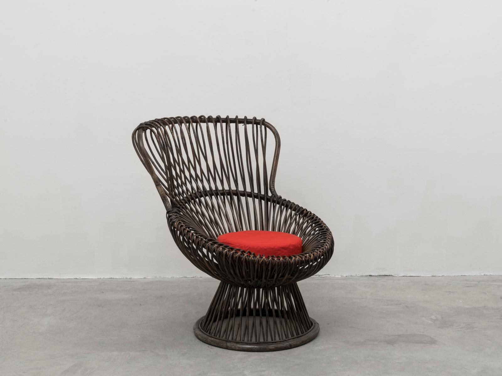 Iconic sculptural Margherita rattan chair, designed by Franco Albini and produced by Bonacina, since 1951. In the 1950s and early 1960s this chair was also retailed by Azucena. This chair has always been used both indoor and outdoor.
Early