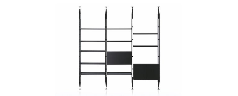 Modular bookcase designed by Franco Albini in 1957. Relaunched in 2008.
Manufactured by Cassina in Italy.

An extremely flexible bookcase, with myriad modular options, suited to being against a wall or as a room partition. Franco Albini designed
