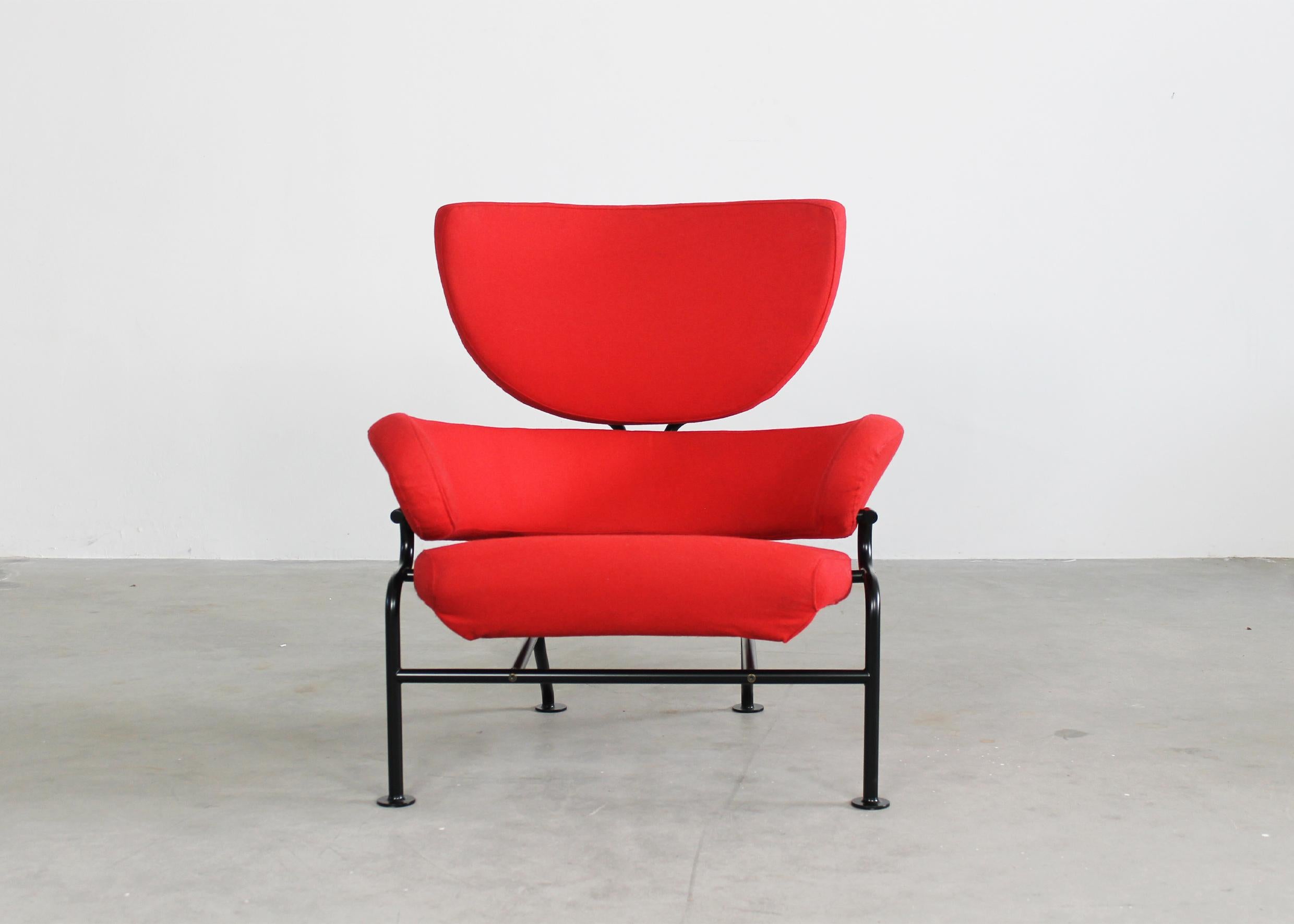 PL19 or Tre Pezzi armchair with frame in black lacquered tubular steel, seat and back in padded red fabric. 
Designed by Franco Albini and Franca Helg in 1959 for the Nuove terme Luigi Zoja in Salsomaggiore, Italy, and produced by Poggi, Pavia