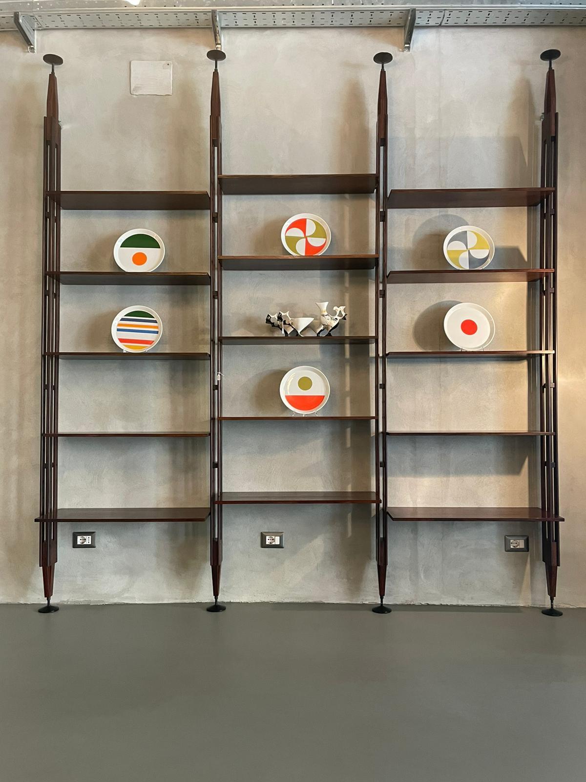 LB7 bookcase designed by Franco Albini for Poggi in Italy, 1950s. 
Bookcase is in rosewood and consists of three sections.
Its height is adjustable from 286 to 310 cm.
The shelves can be freely adjusted on the various levels.
Superior base and the