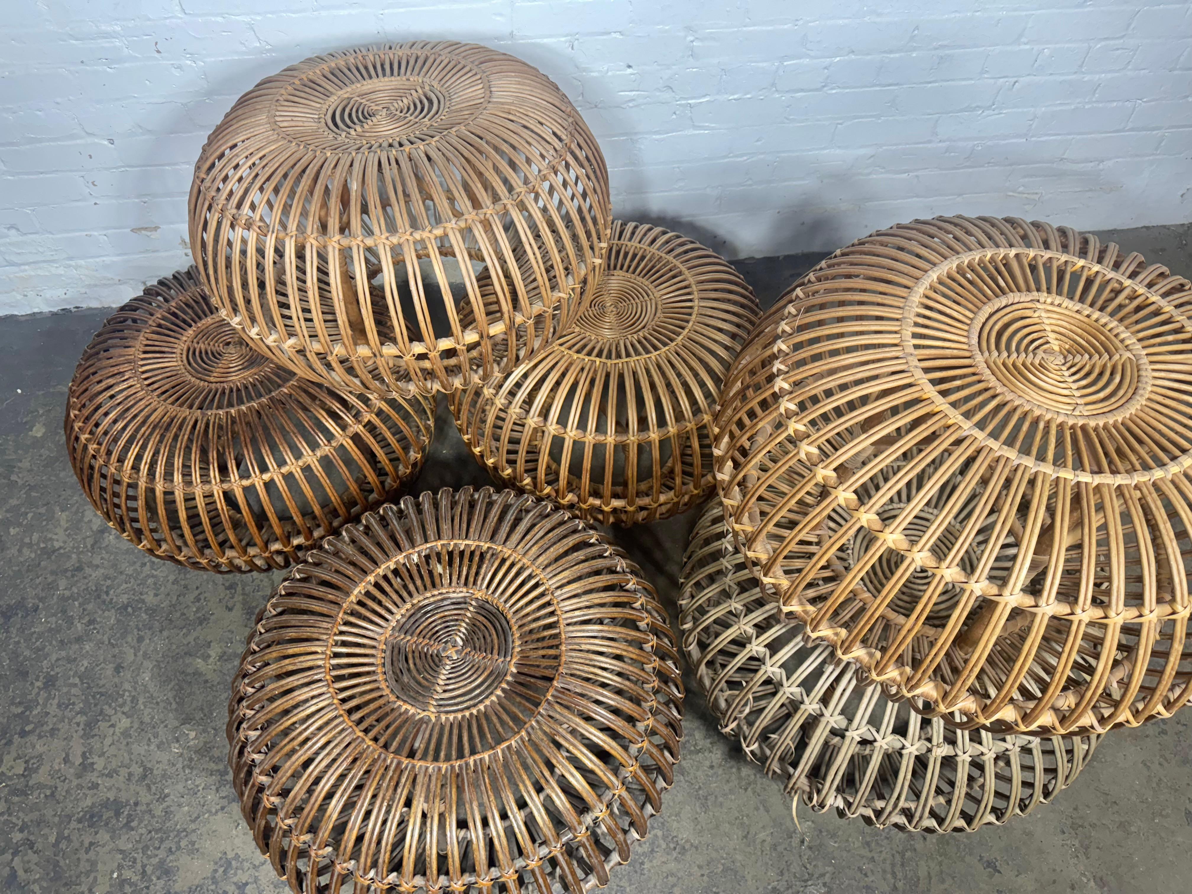 Franco Albini, Large vintage mid-century rattan cane 'Lobster Pot' Ottoman stool ...  airy appearance sturdy and stable . . Split reed ottoman/pouf with solid maple legs that extend from floor to top of seat .. Great collection of (6) Various