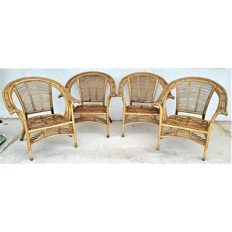 For FULL item description click on CONTINUE READING at the bottom of this page.

Offering One Of Our Recent Palm Beach Estate Fine Furniture Acquisitions Of A 
Set of 4 Franco Albini Viggo Boesen Style Bamboo Rattan Bentwood Armchairs
4 Tropical