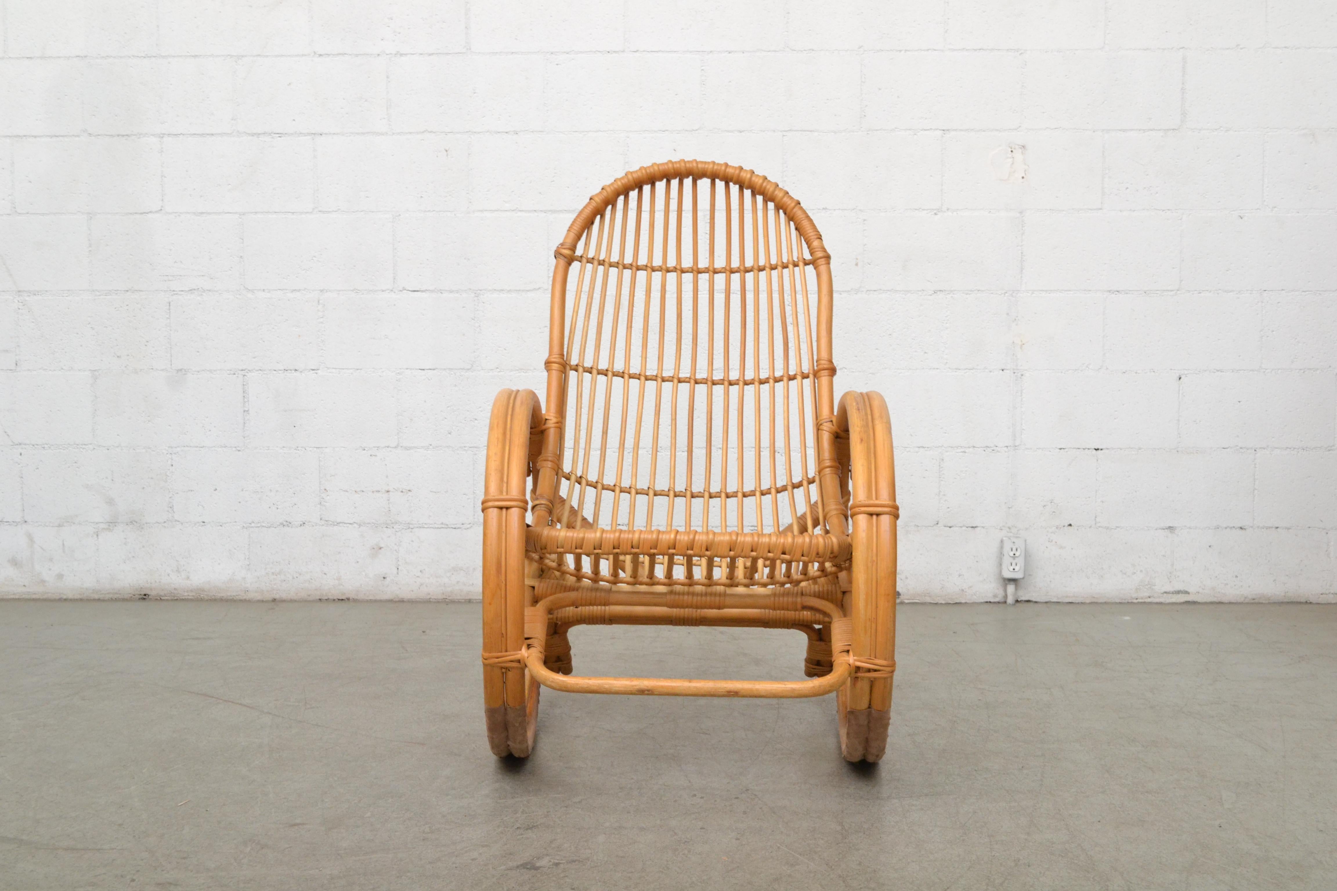 Mid-century bamboo rocking chair inspired by Franco Albini. Great curves. Good original condition. Another similar rocking chair available and listed separately (LU922411449581)