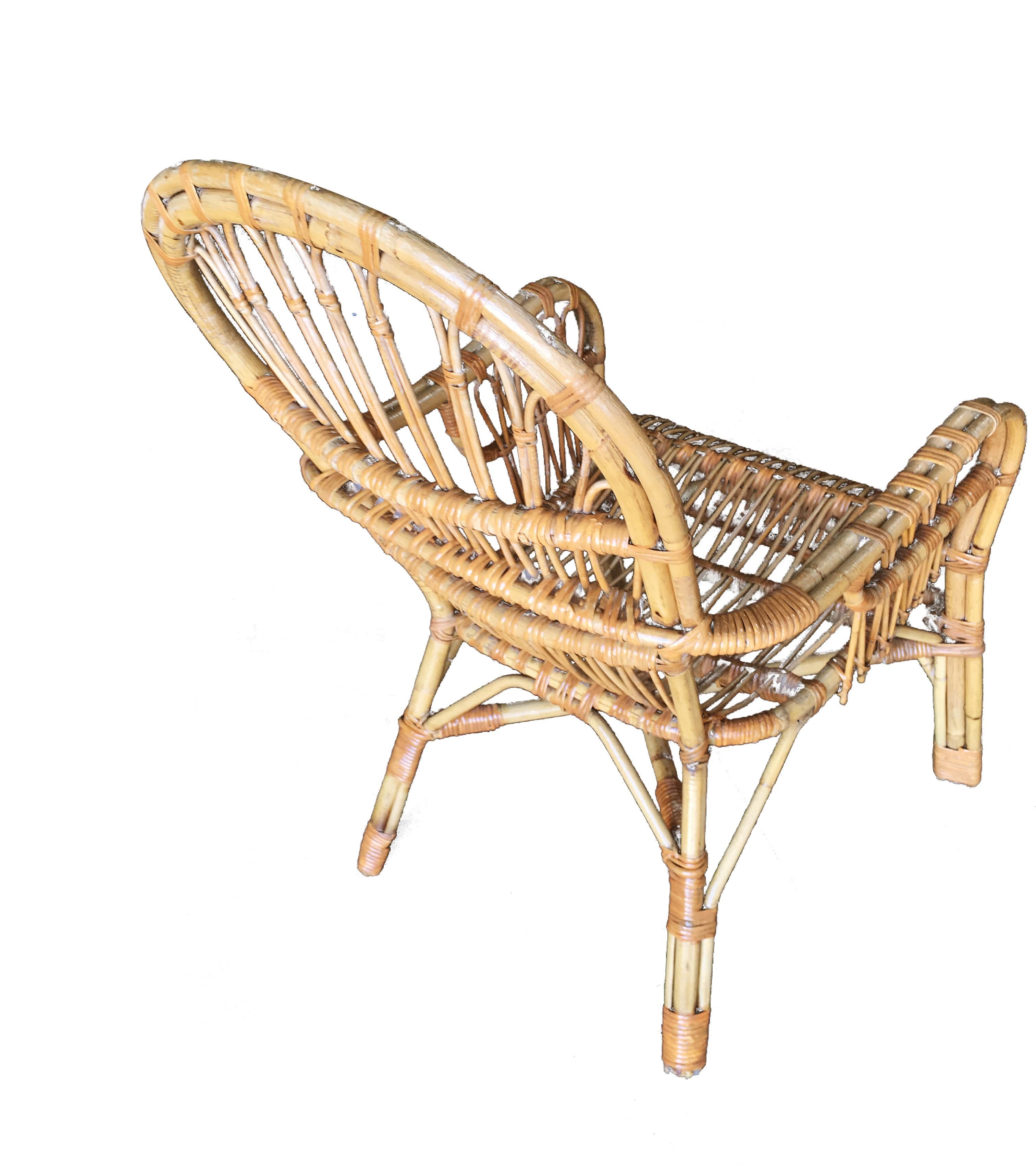 Franco Albini style stick rattan lounge chair featuring unique organic midcentury style.
 
Restored to new for you.
 
All rattan, bamboo and wicker furniture has been painstakingly refurbished to the highest standards with the best materials. All