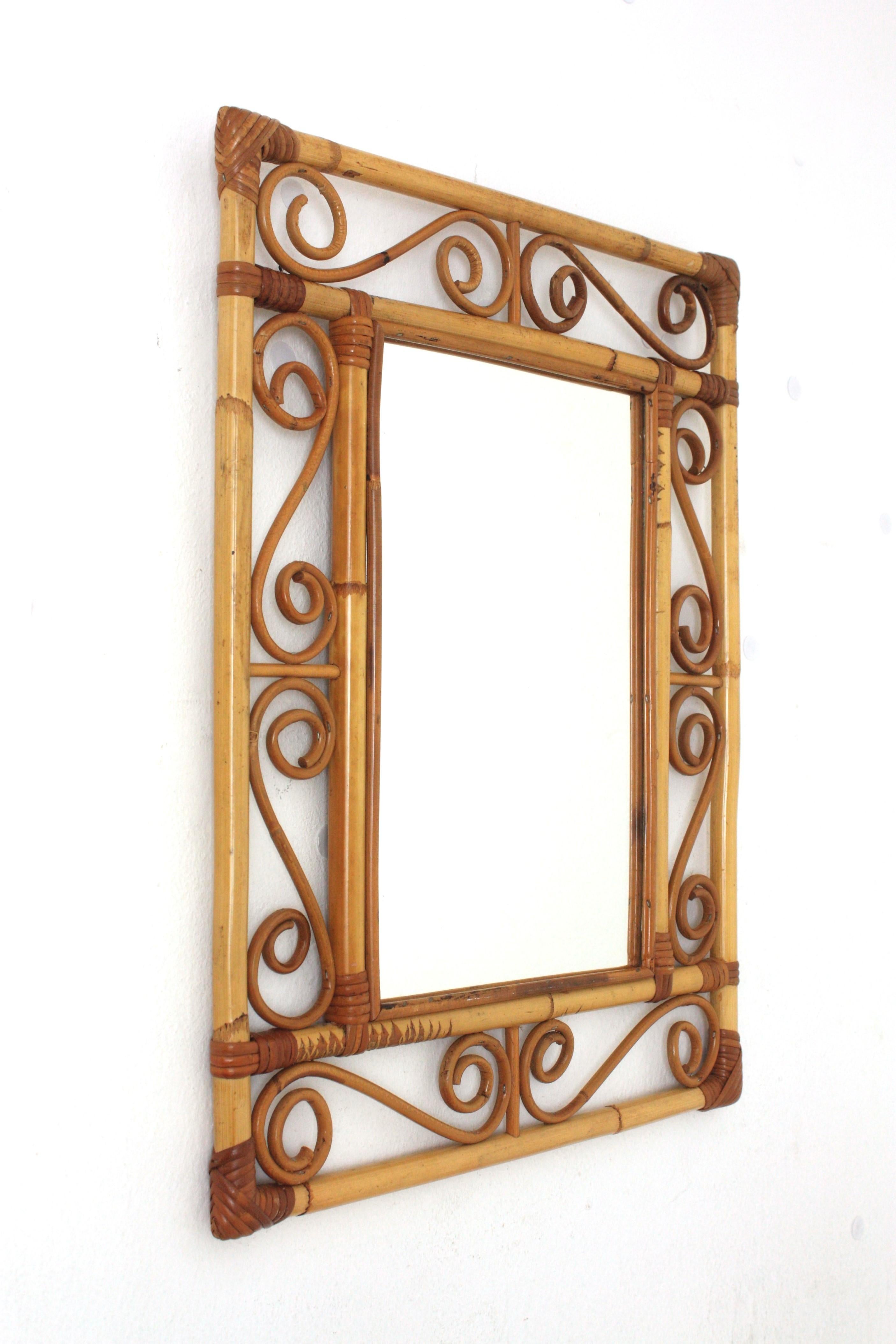 Spanish Franco Albini Style Rattan Rectangular Mirror with Scroll Motifs For Sale