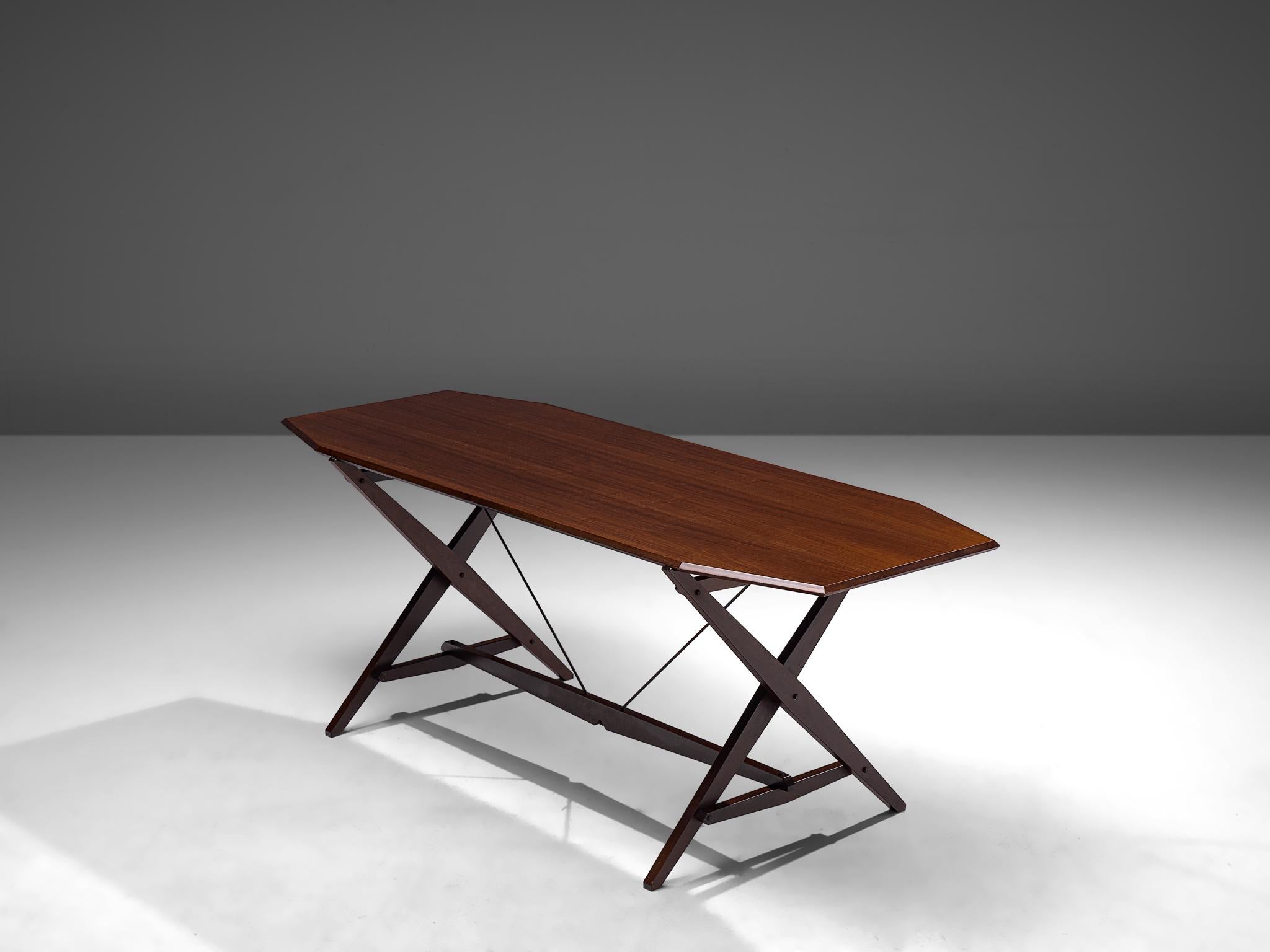 Franco Albini for Poggi, dining table model TL2, walnut and metal, Italy, 1951

The TL2 table by Franco Albini features a simplistic and sleek design. Executed in darkened walnut wood that features a rectangular tabletop with beveled edges. The