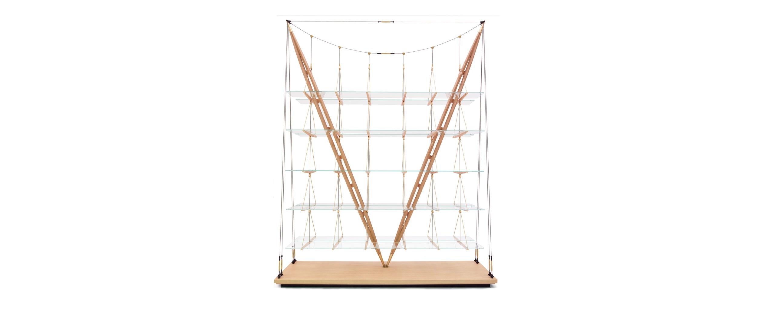 Bookcase designed by Franco Albini in 1940. Relaunched in 2011-19.
Manufactured by Cassina in Italy.

Defying the laws of physics, going beyond what we normally understand by the conditions of equilibrium, this bookcase is nothing short of a