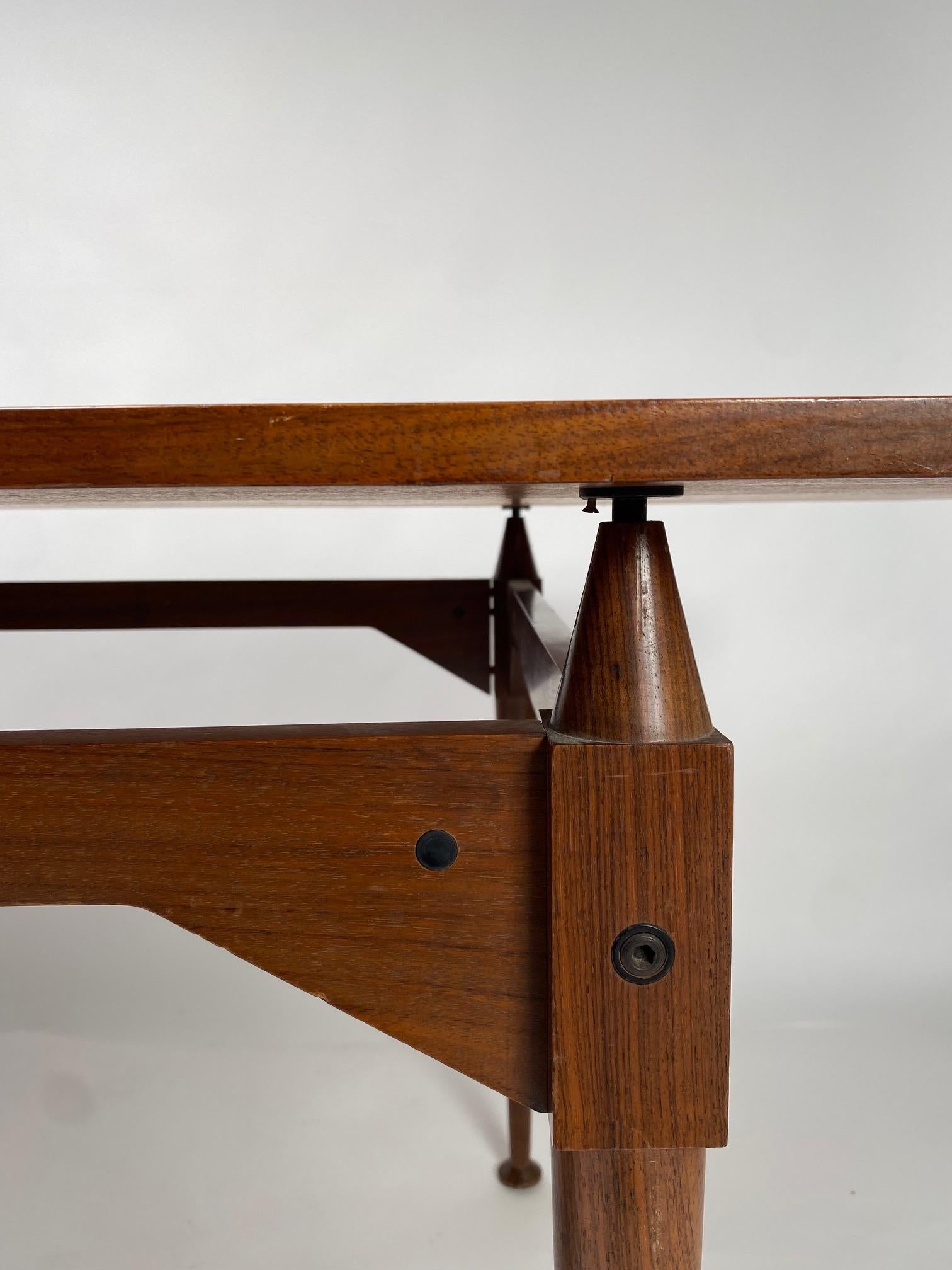 Franco Albini, a mod. TL3 wooden dining table. Poggi Prod., Italy, 1950 ca. (First Edition)

Iconic and highly refined work, the TL3 table was designed in 1953 by Franco Albini, one of the pioneer of Italian mid-century design.
The inverted wooden