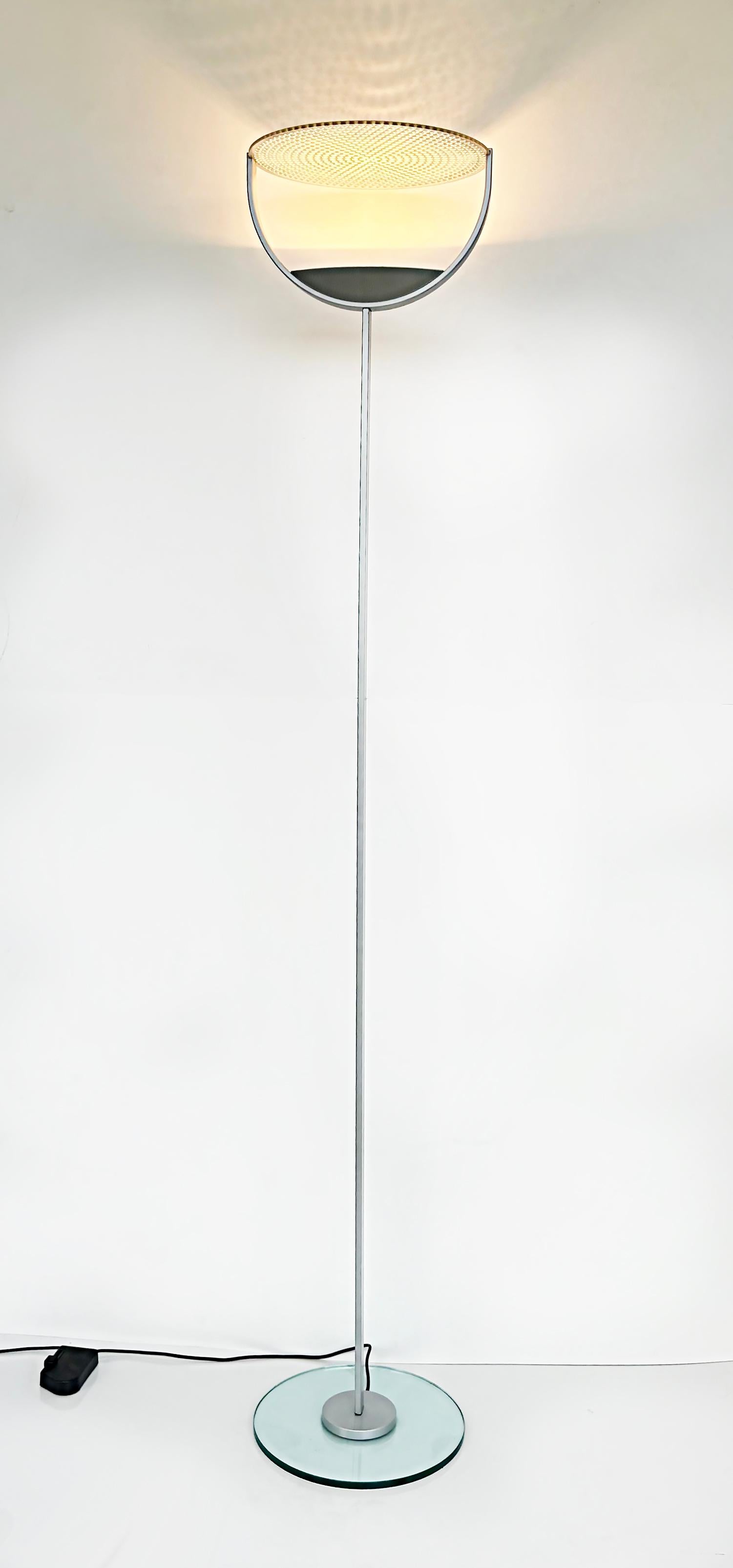 Franco Bettonica, Mario Melocchi Cini & Nils Mixa floor lamp, Italy.

Offered for sale is a 