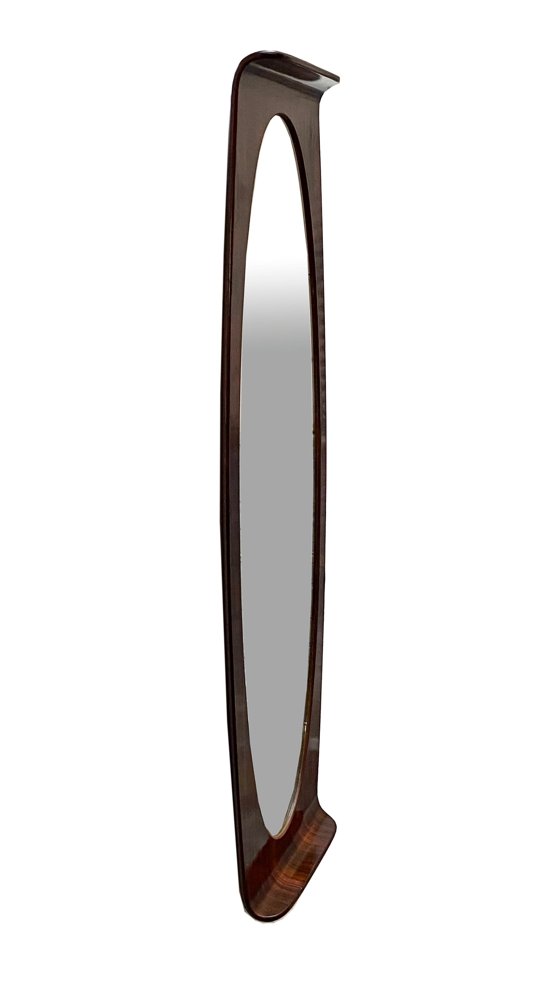 Large mirror with teak wood frame with curved ends, central oval mirror, Italian design by Franco Campo and Carlo Graffi for Home Torino, made in the 1960s. 

