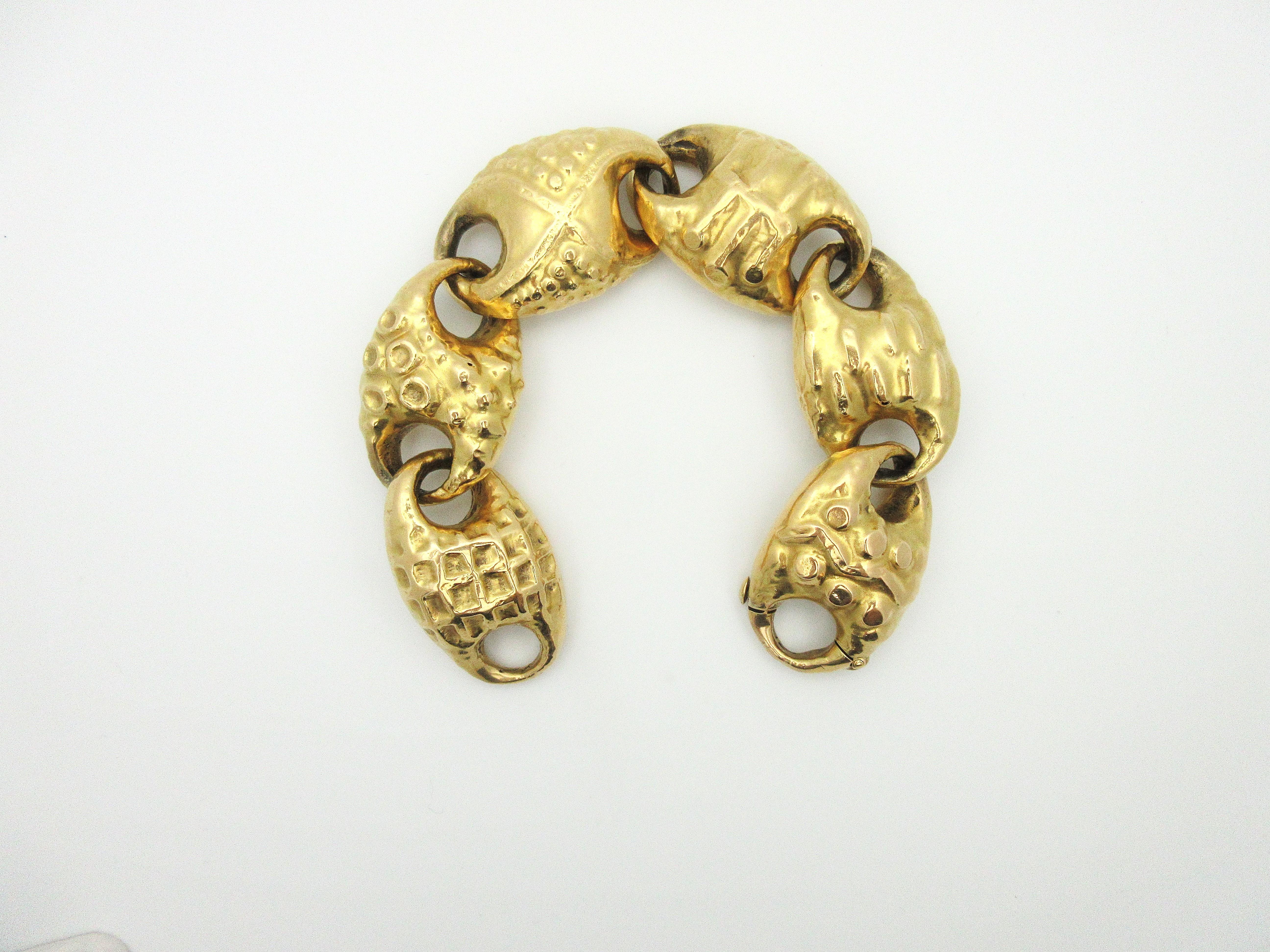 This gorgeous bracelet from the 1950s is a work of art!  During the late 1940s, Mario Masenza ignored tradition by inviting his artist friends to make jewelry for his elaborate baroque boutique in Rome, Italy.    Franco Cannilla was one such artist