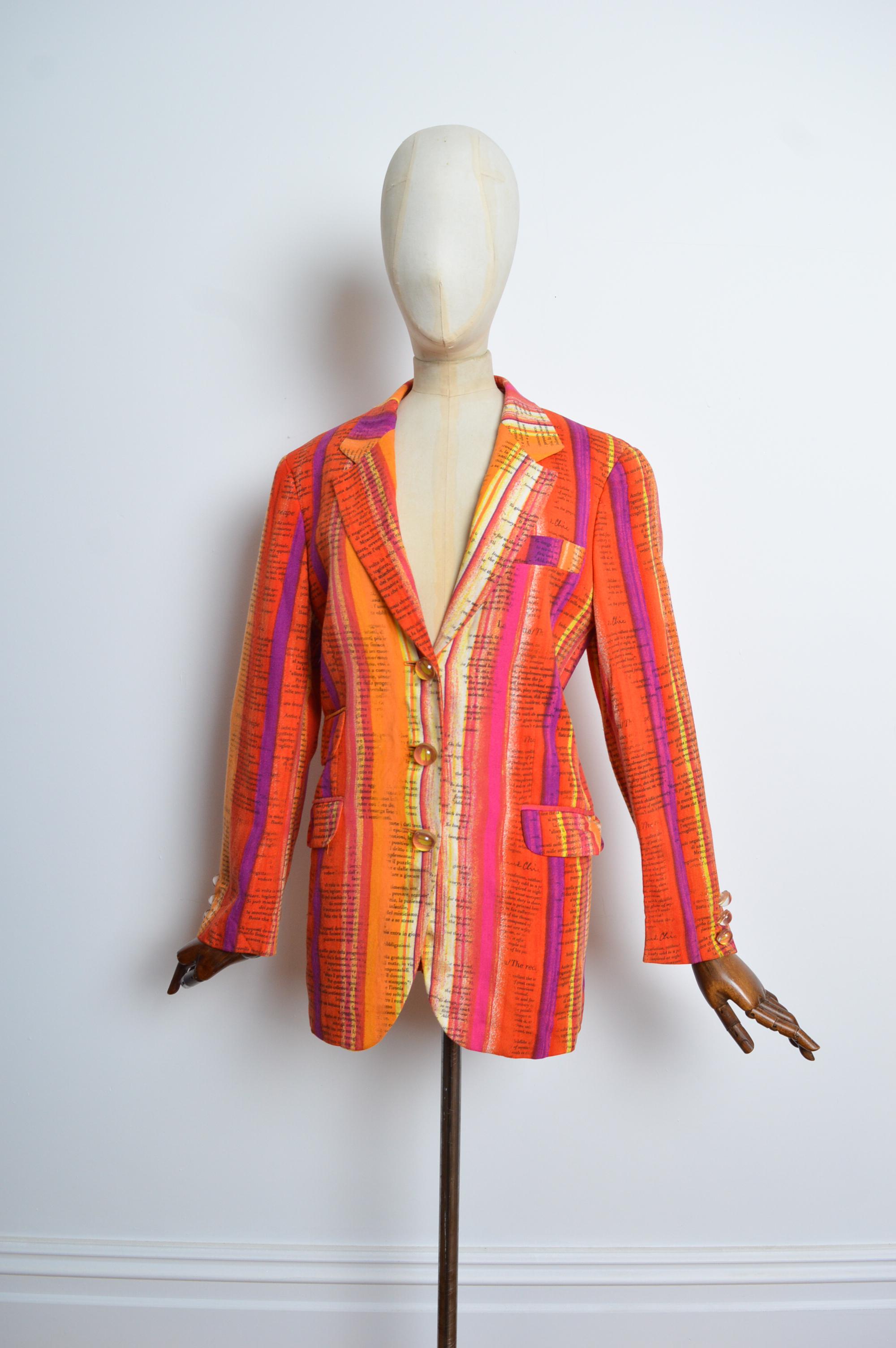1990's Franco Moschino 'CHEAP & CHIC' Blazer with Sunset coloured Ombré 'paint-stroke' pattern through out.
MADE IN ITALY.
The Jacket features an oversized boxy silhouette with long sleeves and buttons down the front and fully lined interior in