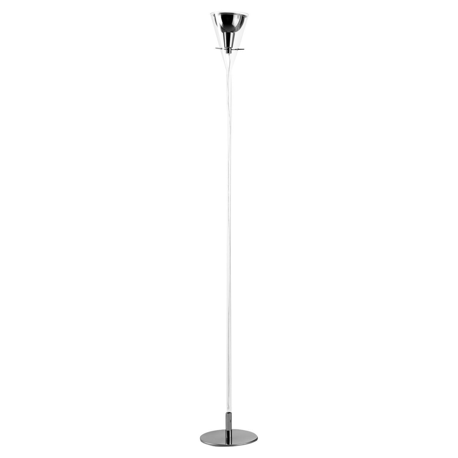 Designed by Franco Raggi and manufactured by Fontana Arte, the flute floor lamp designed in 1999 is made from a glass cone that holds the chromed aluminium reflector, supported by three slender metal rods. Equilibrium and lightness for this family