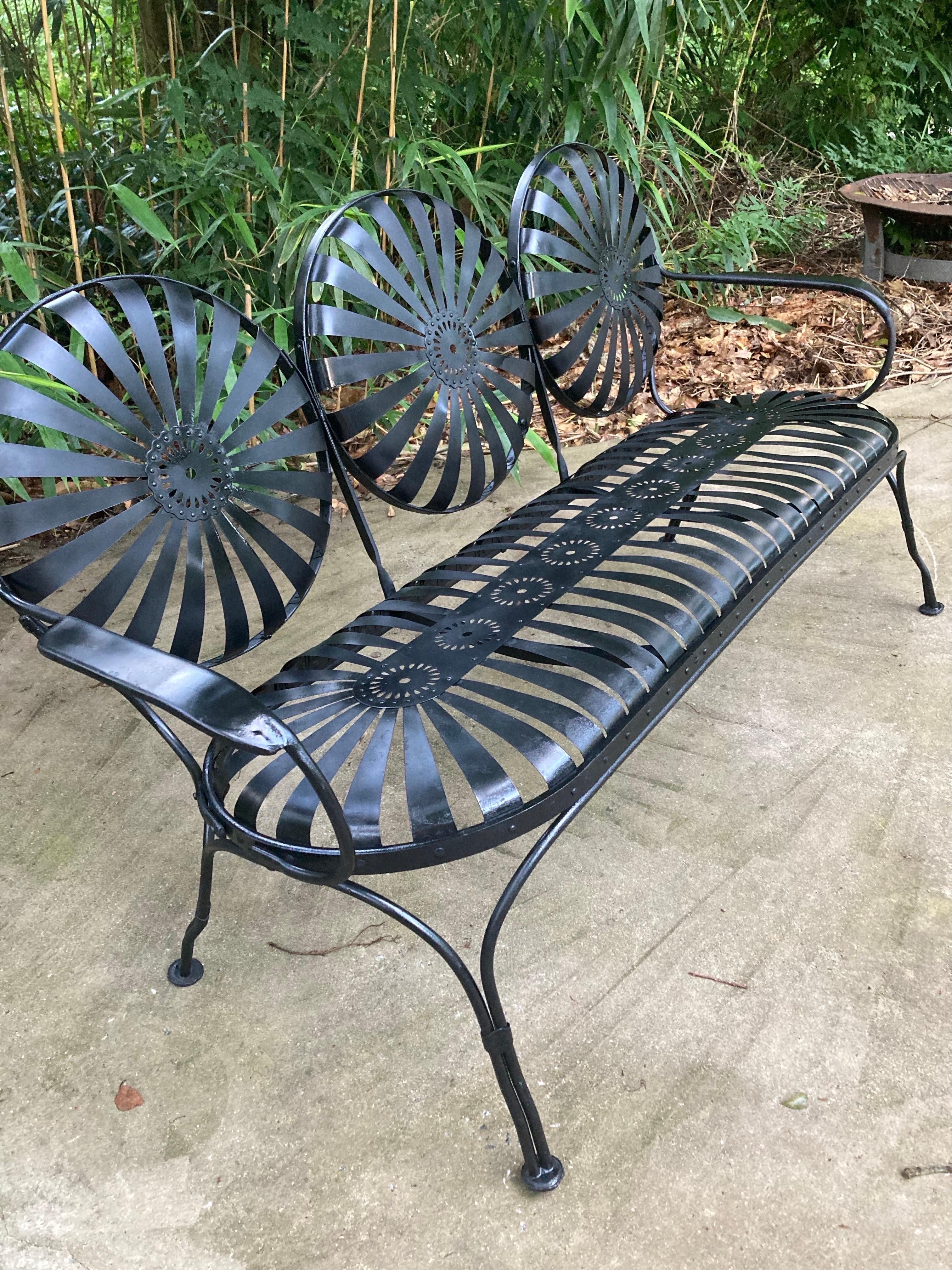 true early 20th century relic, heavy iron with spring steel seats, some welded repair.. recently sandblasted and painted
60 wide, 25 deep, 31 talk 16.5 seat to floor

shipping from athens, ga