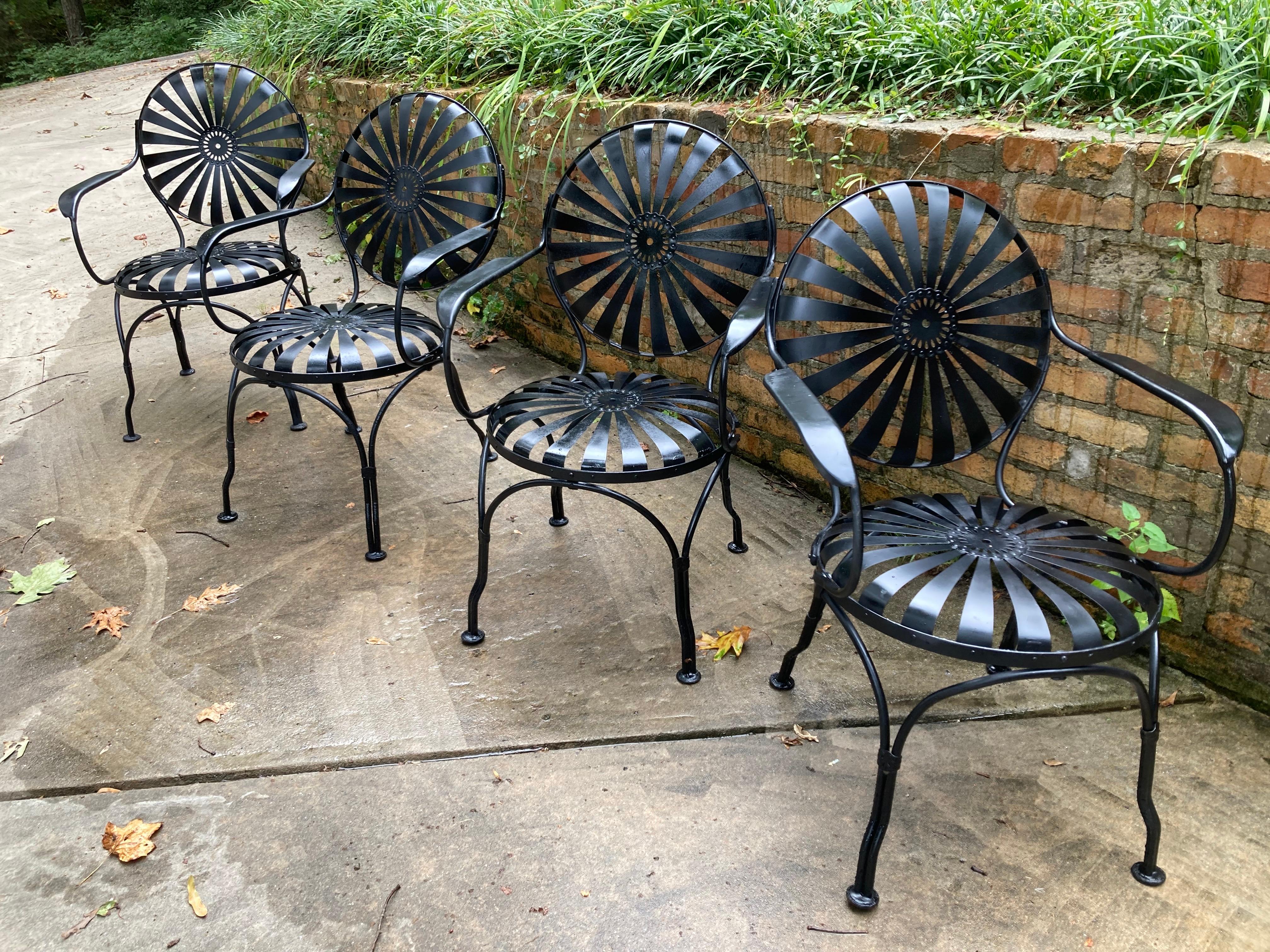 
spring steel chair, pinwheel design
no maker’s mark

seat to floor is 17

23 by 24 by 34 tall

shipping from athens ga, 30606 