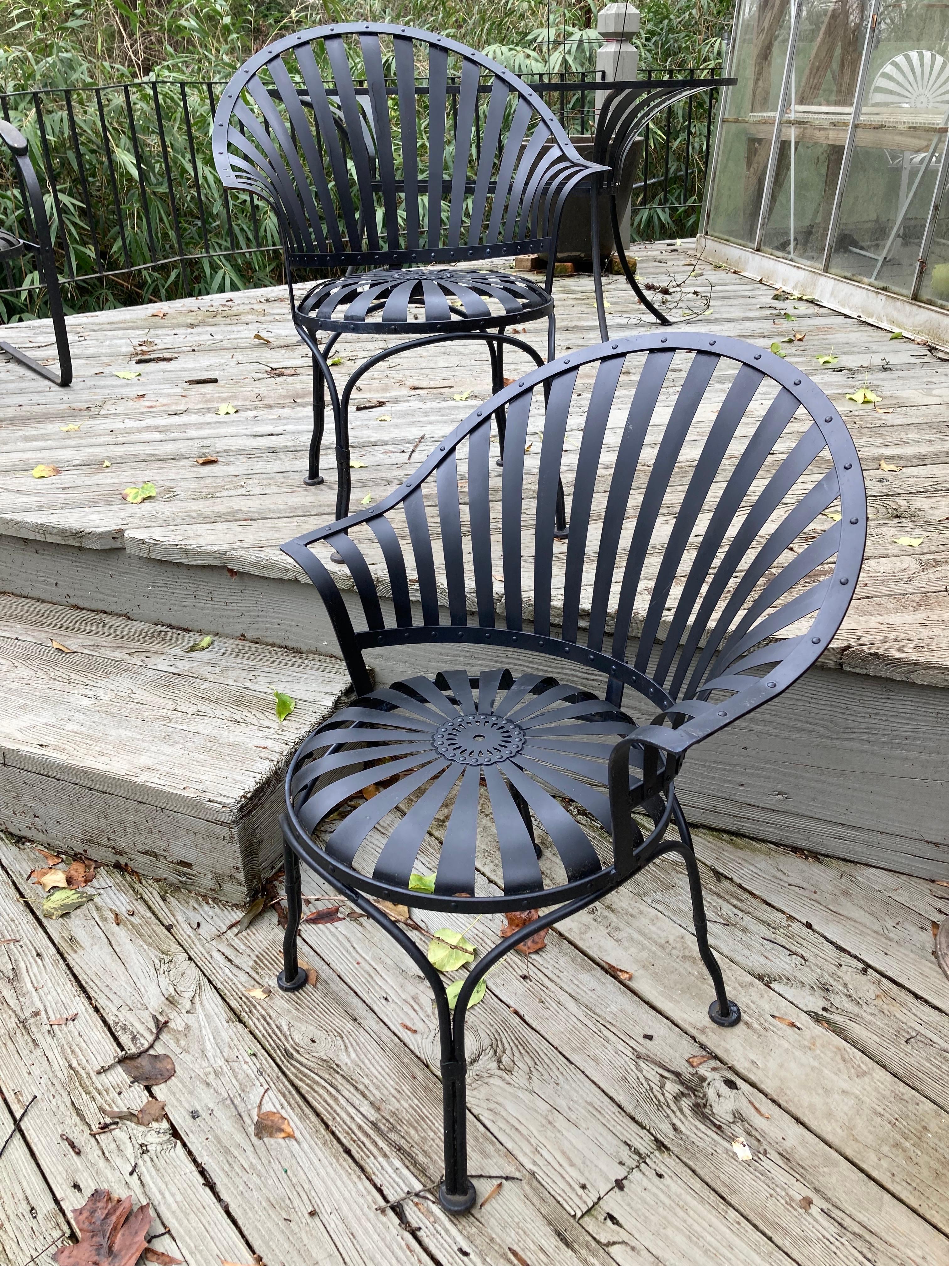 20th Century francois carre fan-back iron garden chairs - a pair