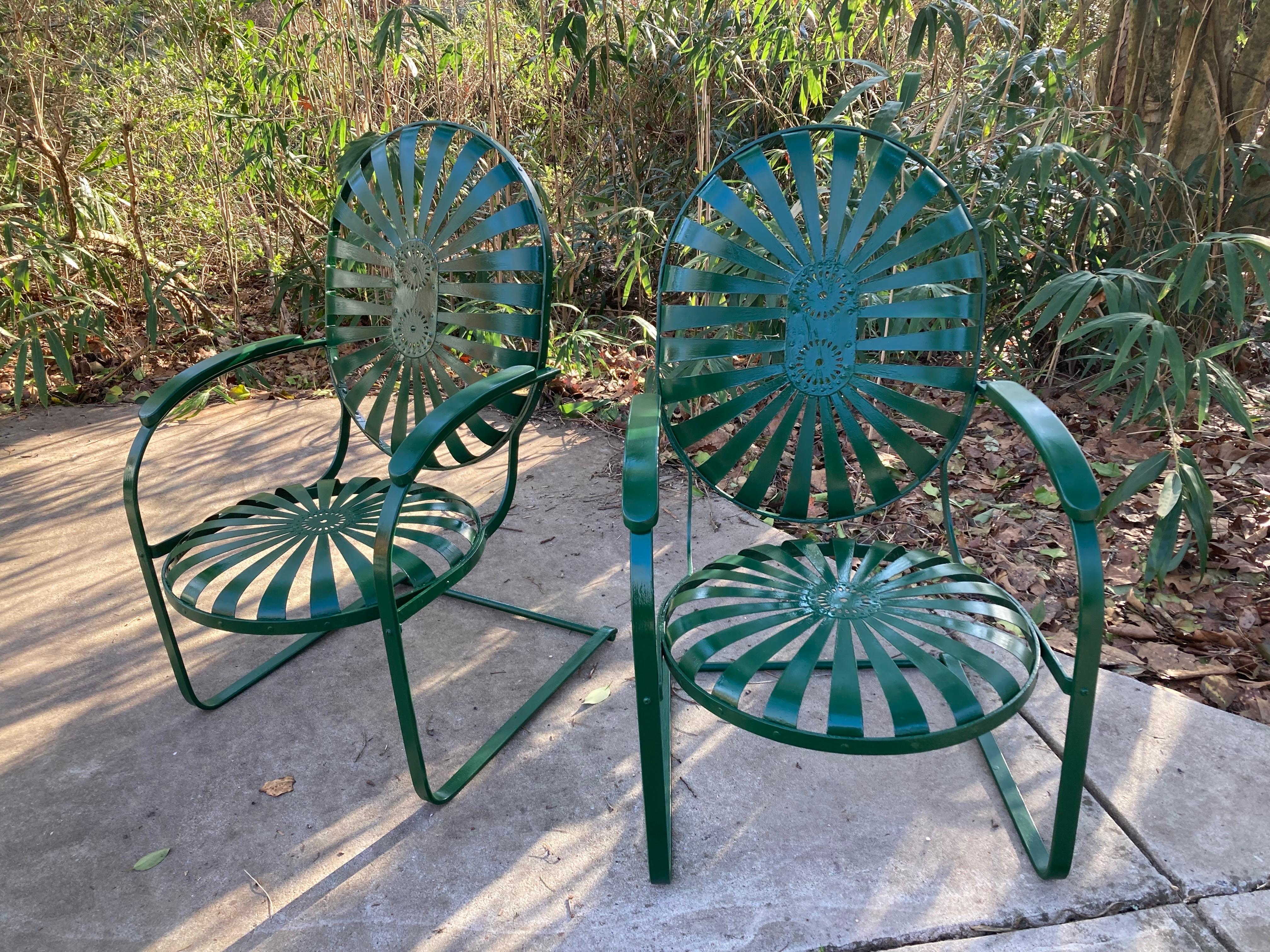 iconic pair in hunter green, large cantilever ‘bouncers’. spring wheel design with steel fins and an iron frame. sold as a pair
no maker’s mark less

DIMENSIONS
25ʺW × 26ʺD × 41.5ʺH