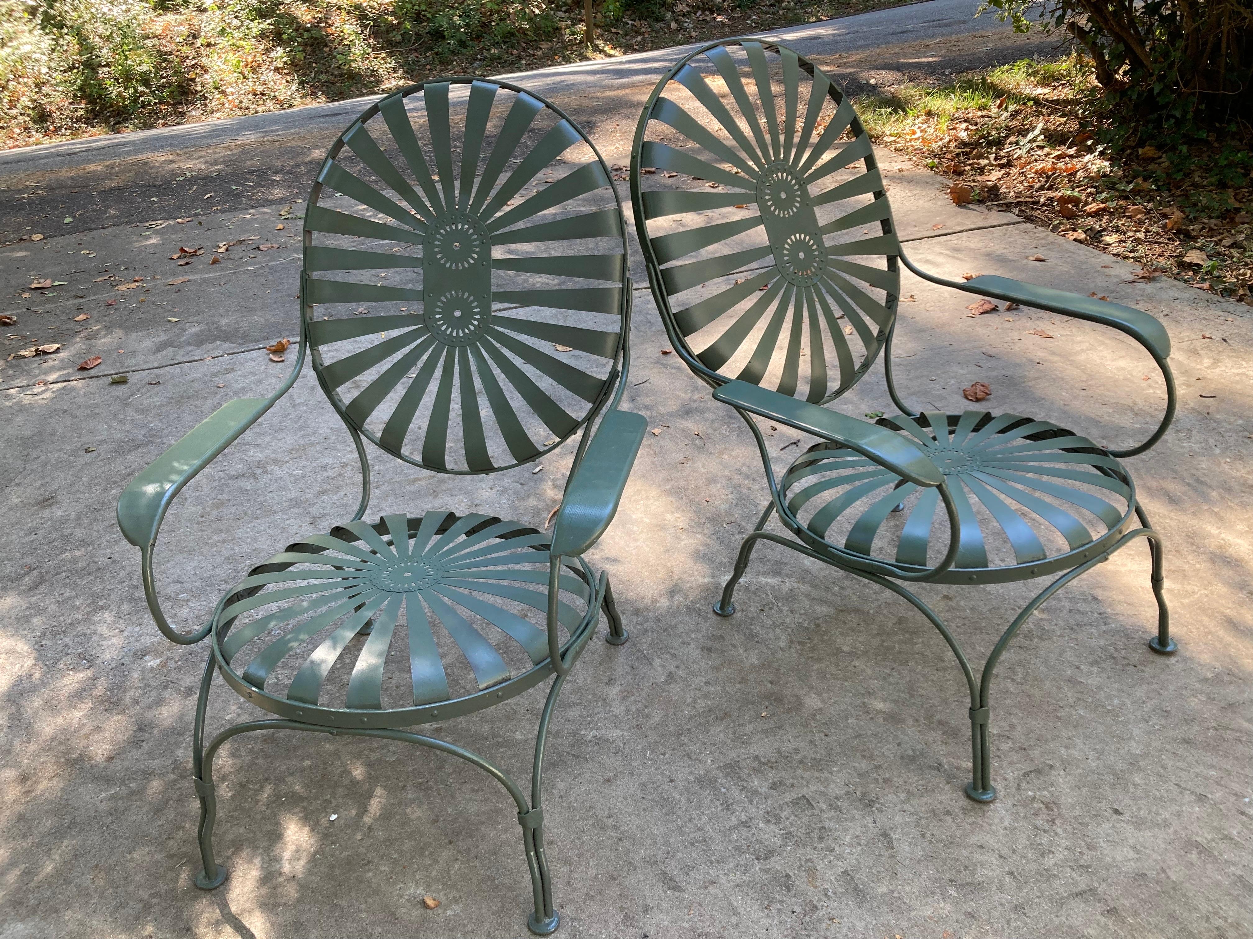 mid century duo, sandblasted and primed then painted in a satin italian olive hue  38 tall, firm sproing steel seating, sold as a pair
perfect for any patio or garden
circa 1930
shipping from ahens, ga