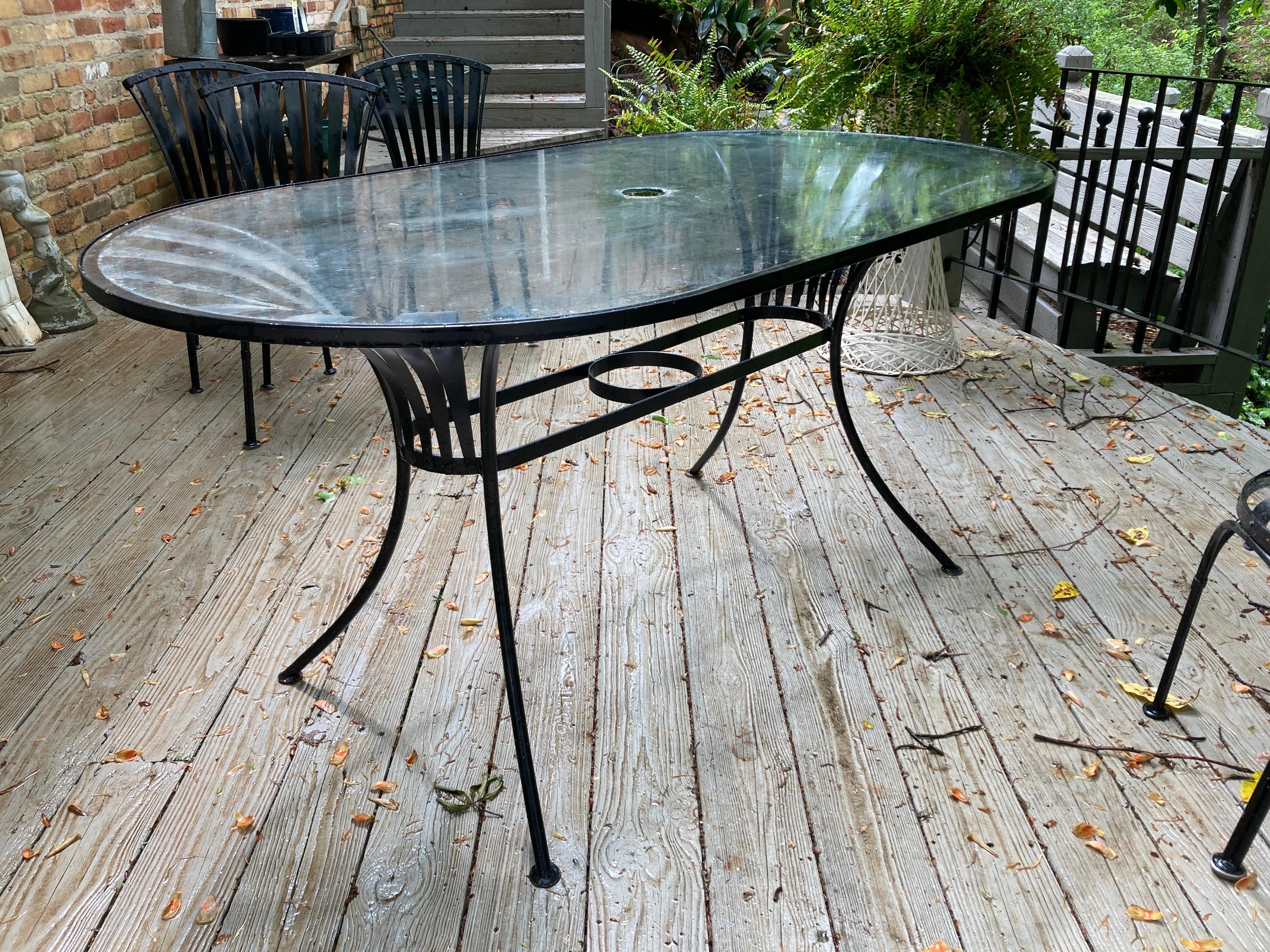 in near mint condition, lived most of their lives in a carolina coastal home on a screened in porch.

table is 60 wide, 33.5 deep and 30 tall

glass has umbrella hole, client can purchase protective ring at any patio store based on the size of your
