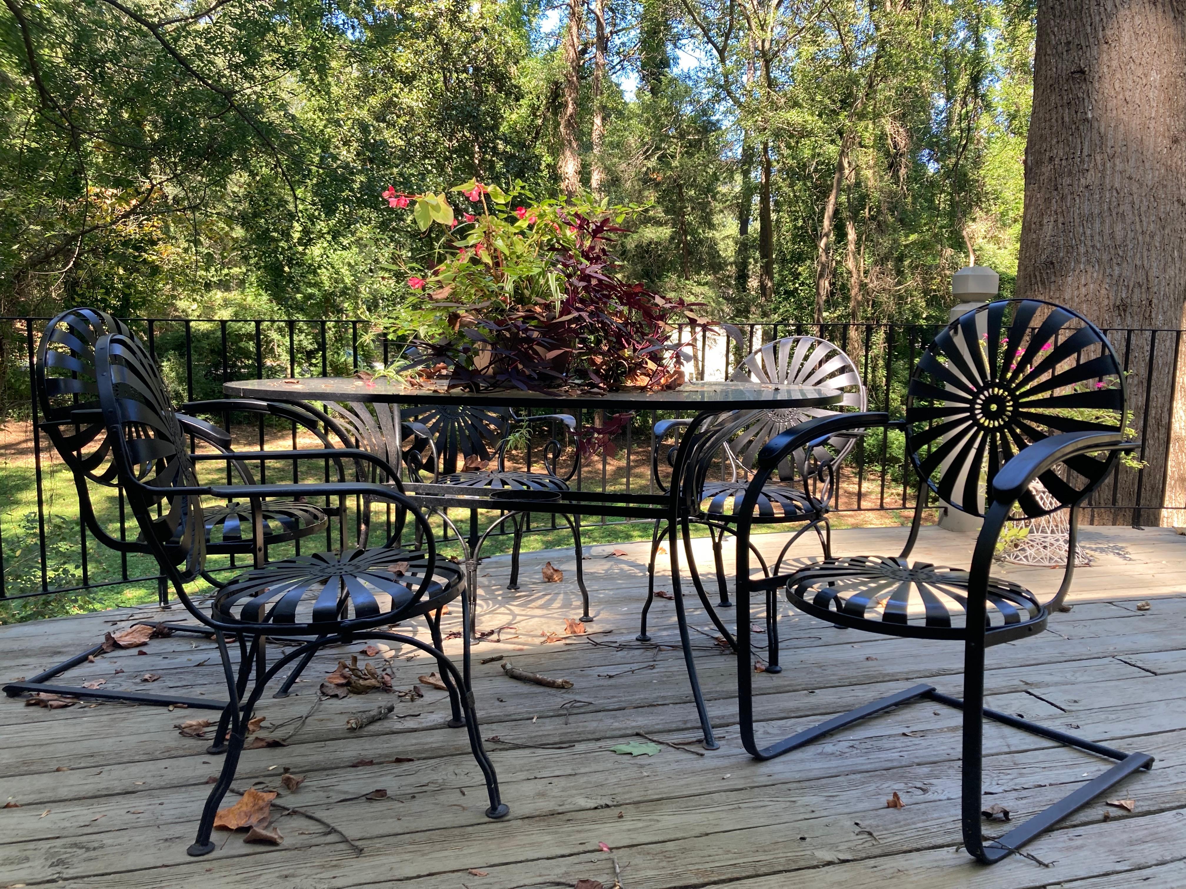 in near mint condition, lived most of their lives in a carolina coastal home on a screened in porch.

table is 60 wide, 33.5 deep and 30 tall

glass has umbrella hole, client can purchase protective ring at any patio store based on the size of your