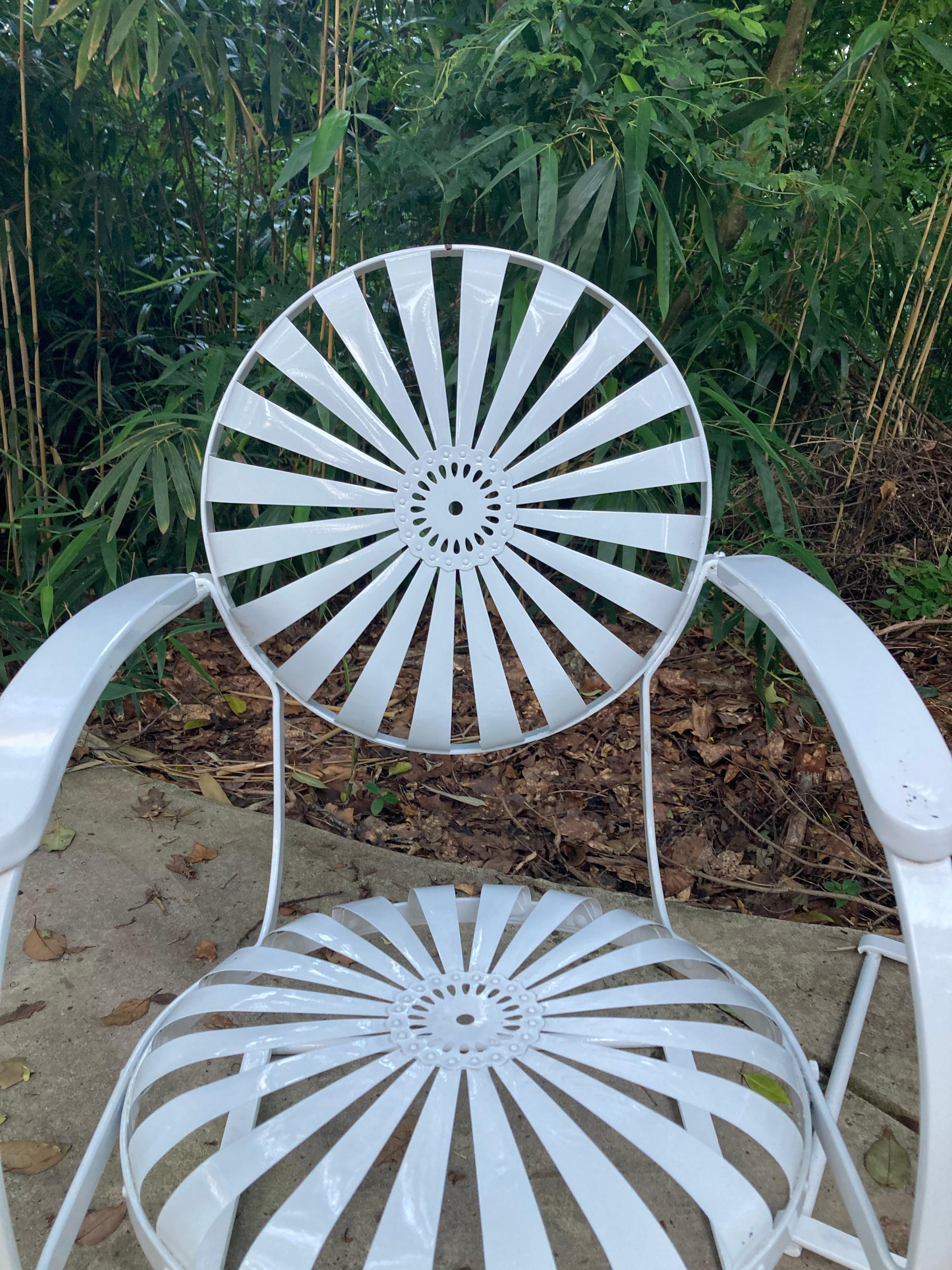 francois carre strap iron cantilever garden chairs
Shipping from athens, ga
30606


antique sunburst garden chairs with a rocking cantilever base...

measuring 36 tall, 26 deep and 22 wide

17 seat to floor
no maker's mark