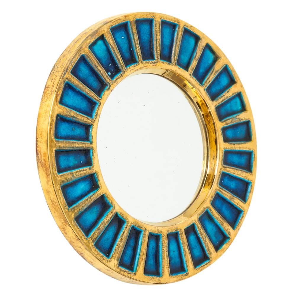 Francois Francois Lembo ceramic mirror gold blue signed, France, 1970s. Larger scale Lembo mirror with good colors. Signed on the back: F. Lembo.


A native of Vallauris François Lembo started his pottery career in 1951 in the workshops of Calva and
