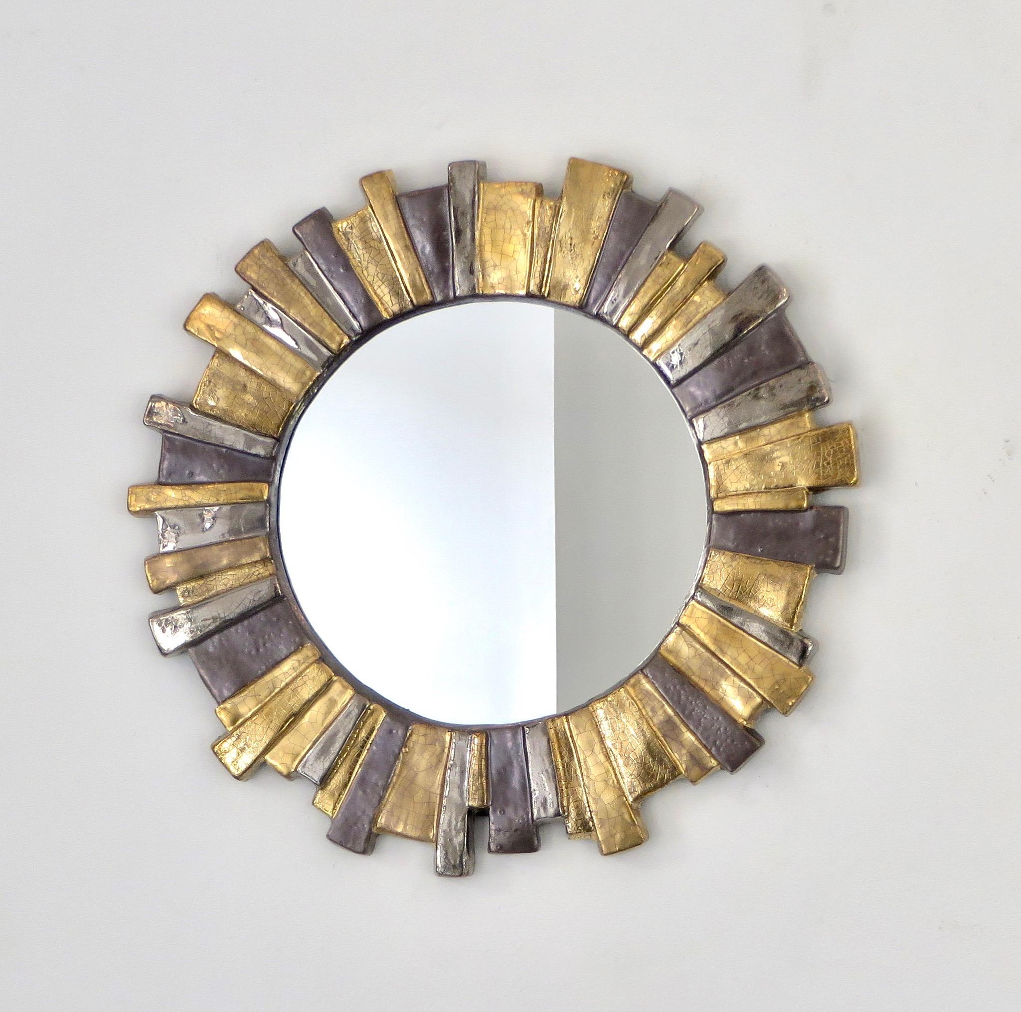 Francois Lembo handmade gold, grey and silver ceramic crackle glazed sunburst mirror. 
France, 1970s. In very good original condition with felt backing.
An very unusual and rare model in its abstract form and asymmetrical form.
A native of