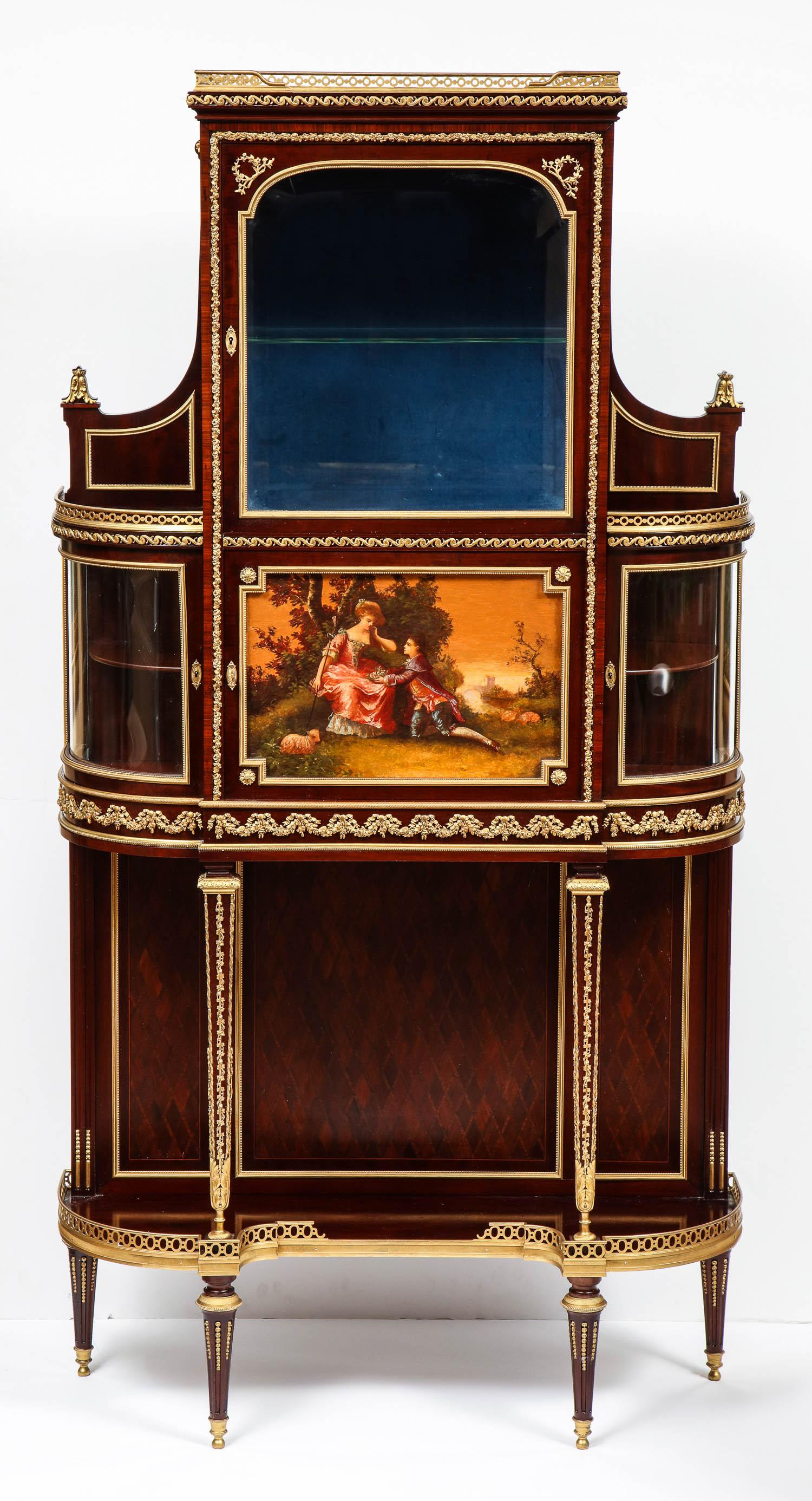 Francois Linke, a rare and important near pair of French ormolu and Vernis Martin vitrines,
circa 1890.

Francois Linke index number 75. 
Francois Linke title: Meubles crédence, guirlandes dans la ceinture, panneau vernis Martin.

Mahogany,