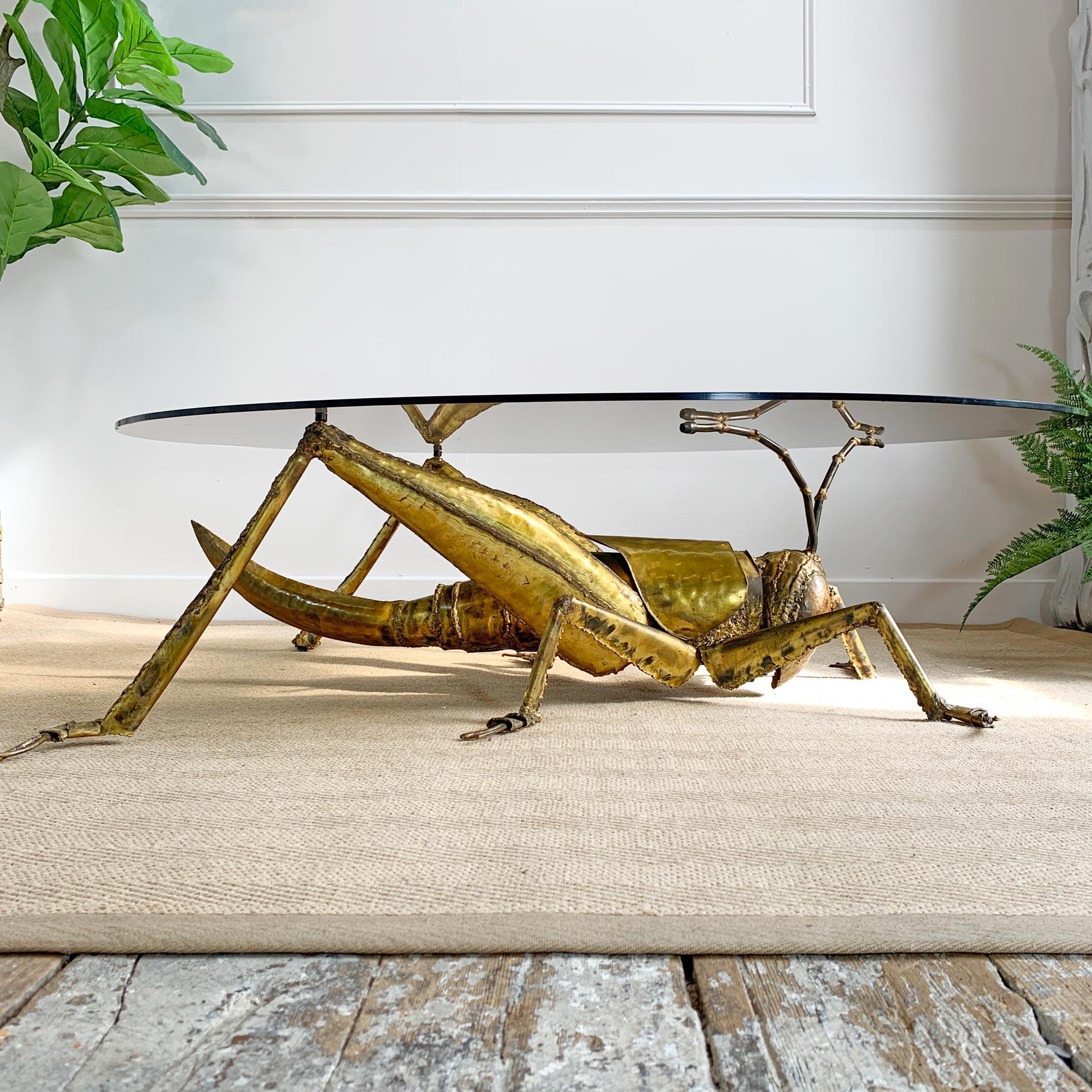 An exceptional brass and steel Grasshopper table created by the renowned French Sculptor and Artist, Francois Melin in the 1970s'. The table has been hand crafted by Melin using individual pieces of brass, shaped to form the various sections of the