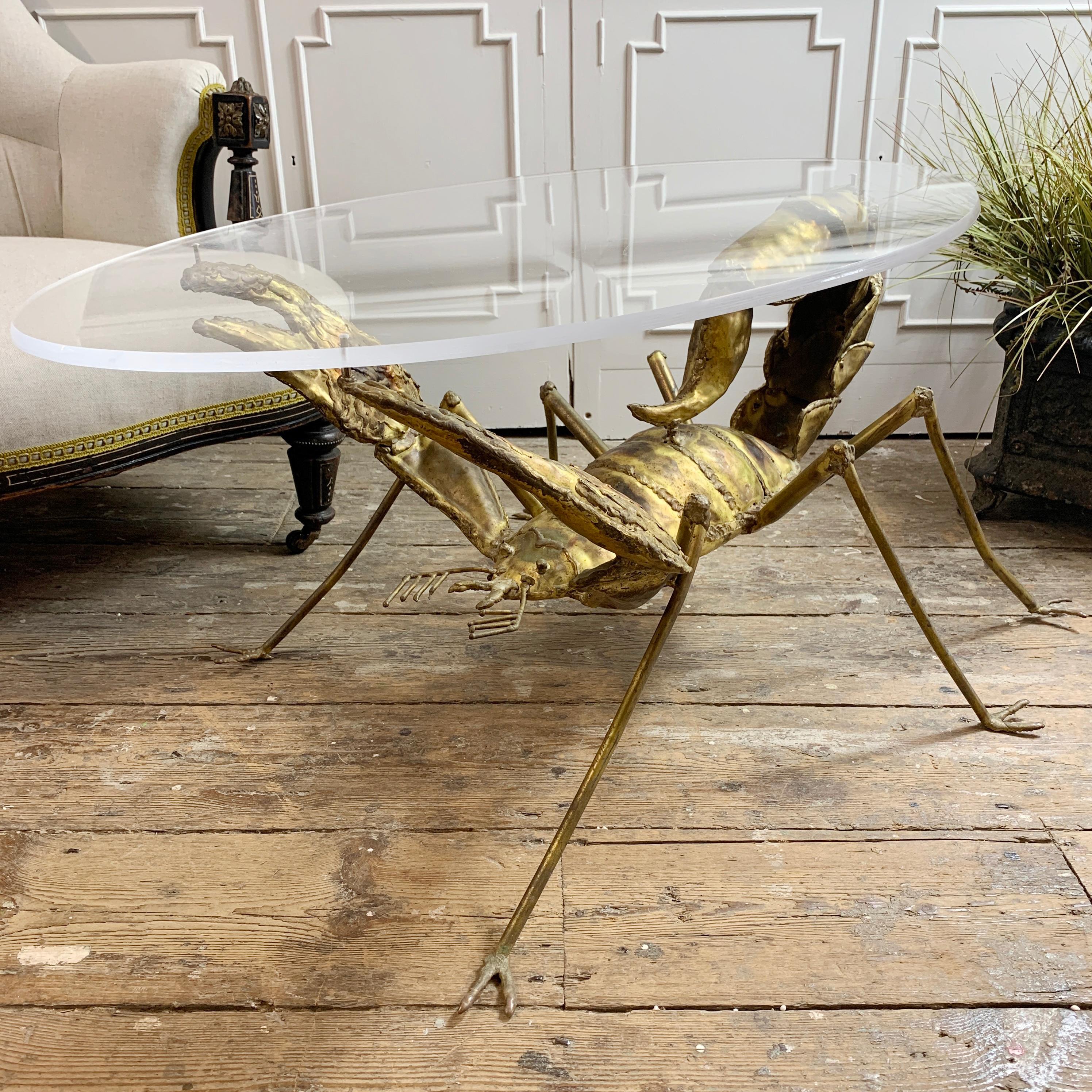 Une table Scorpion exceptionnelle en laiton et acier créée par le célèbre sculpteur et artiste français François Melin dans les années 1970. La table a été fabriquée à la main par Melin à l'aide de pièces individuelles en laiton:: façonnées pour