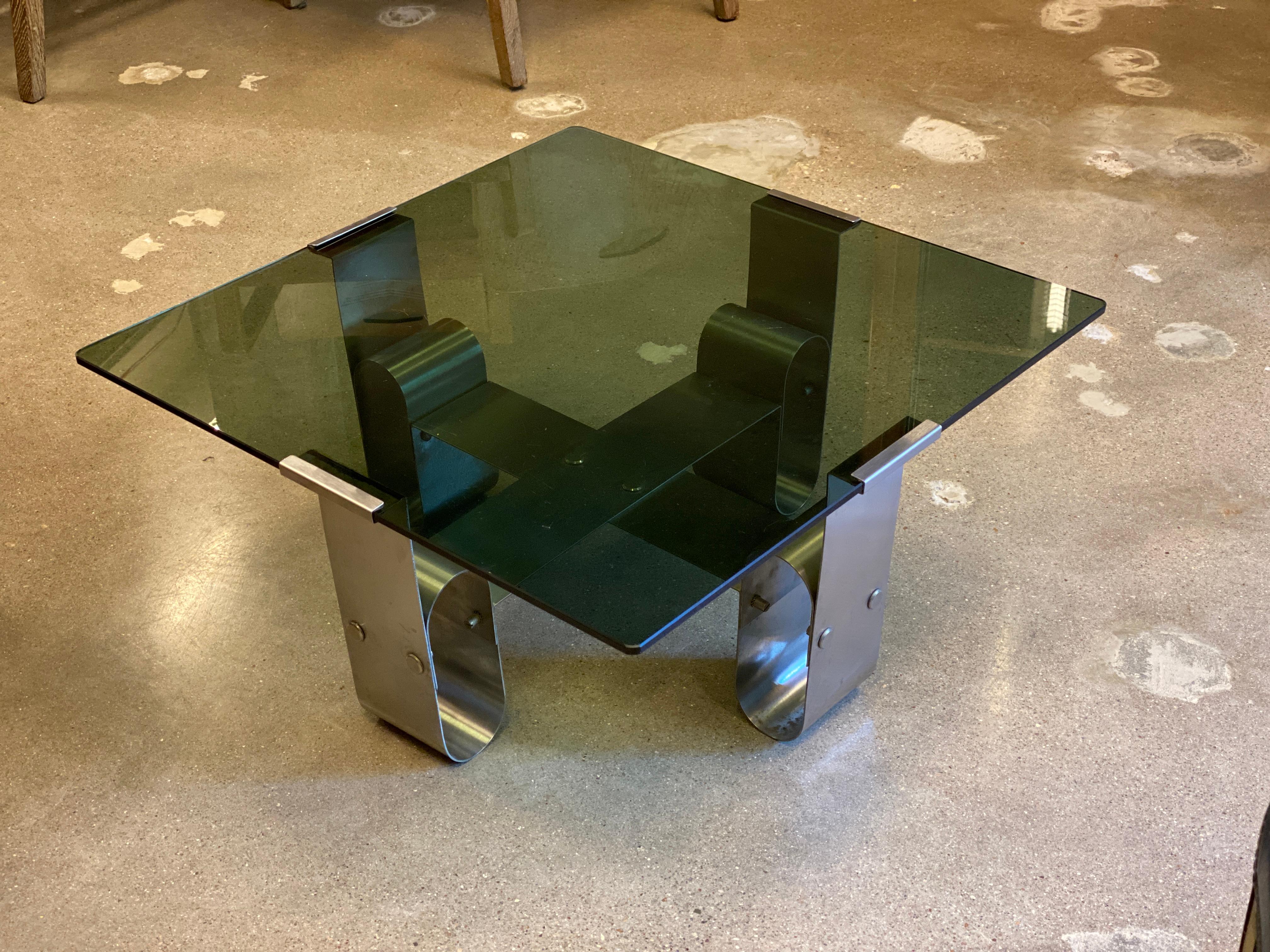 Vintage French Mid-Century Modern table by Francois Monnet for Kappa. Smoked glass is compression fitted to the brushed stainless steel base, circa 1970.