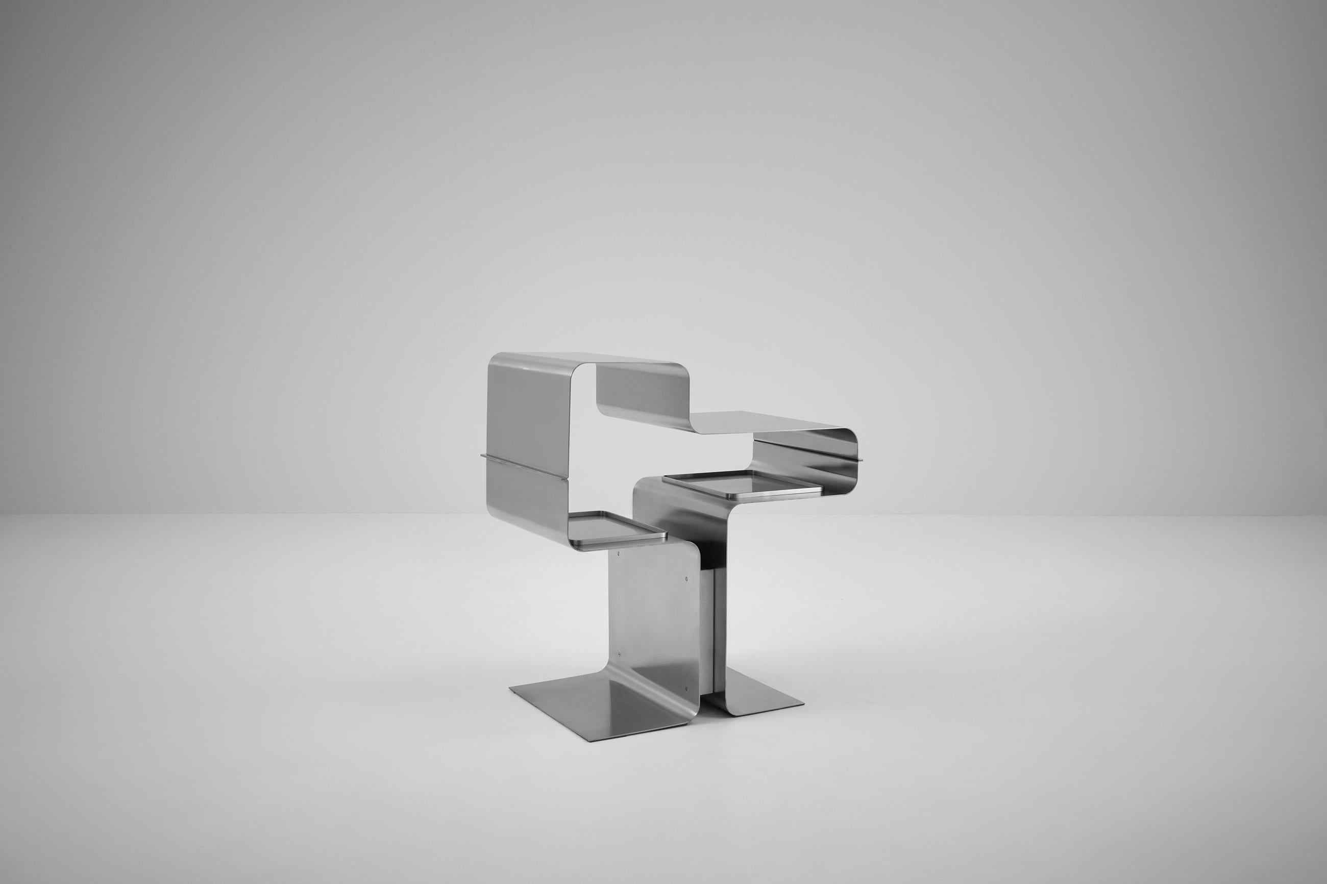 François Monnet console for Kappa, 1970s. Fantastic sculptural design made from folded stainless steel.
The console is cleaned and professionally re-brushed with the preserve of it's original character, therefore in a very good condition without