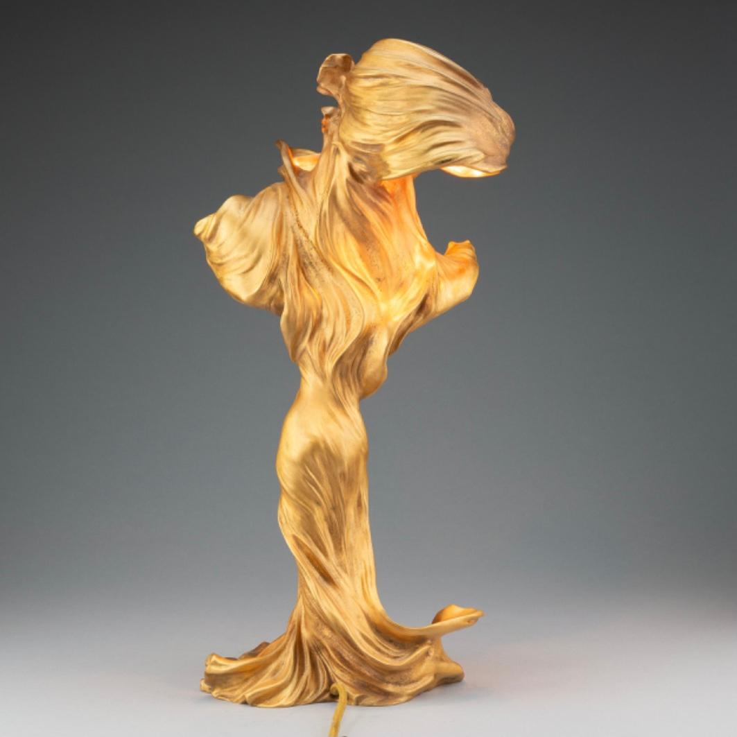 Raoul François Larche Art Nouveau Gilt Bronze Table Lamp
Possibly the most coveted lamp on the planet by discerning collectors.
Loïe Fuller Table Lamp, circa 1900
Siot-Decauville Foundeurs 
Height: 17.5 Inches x 8.5 Inches Wide x 10-1/2 inches Deep