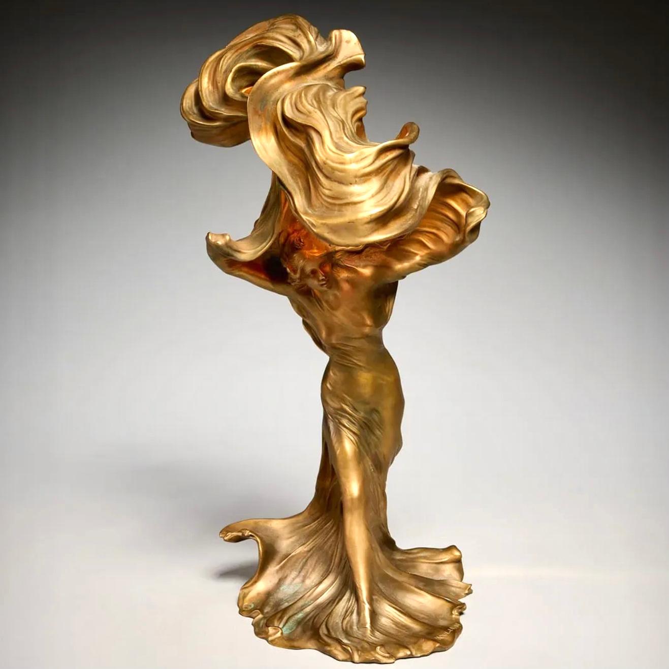 Francois-Raoul Larche 'Loie Fuller' Gilt Bronze Figural Table Lamp

The pinnacle of bronze Art Nouveau lamps for your consideration. This particular Raoul Larch lamp has a beautiful bronze gilt color which is not a bright gold. The chasing is