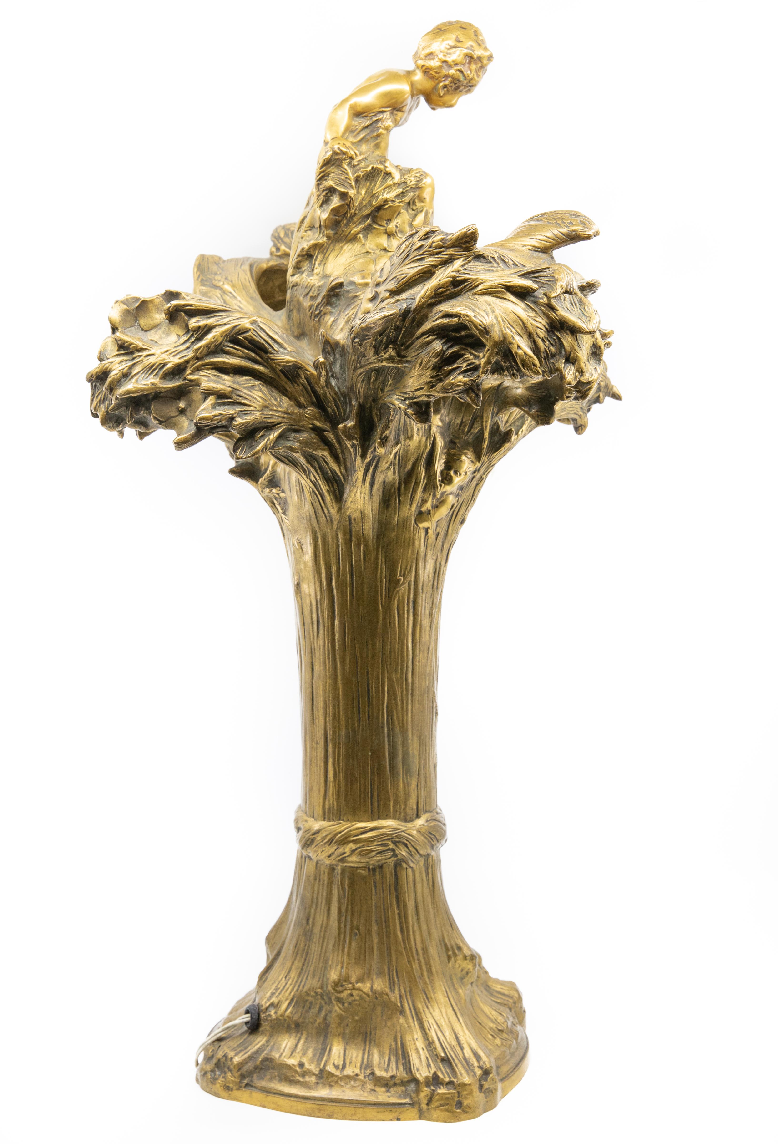 François-Raoul Larche bronze lamp, France, early to mid-20th century, depicting putti frolicking in wheat stalks, 