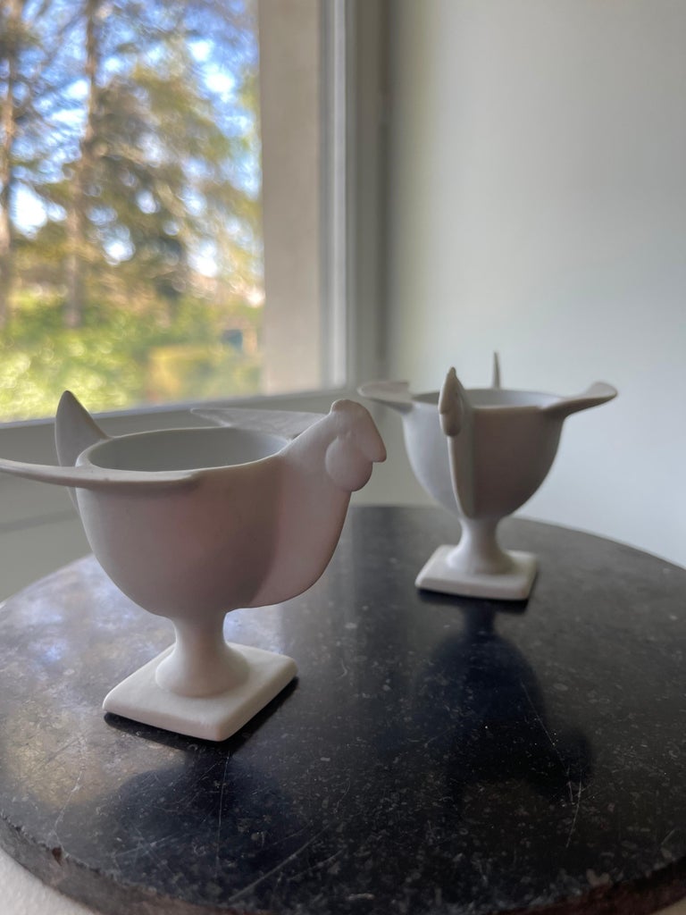 A pair of biscuit eggcup, stamp Lalanne (1927-2008).