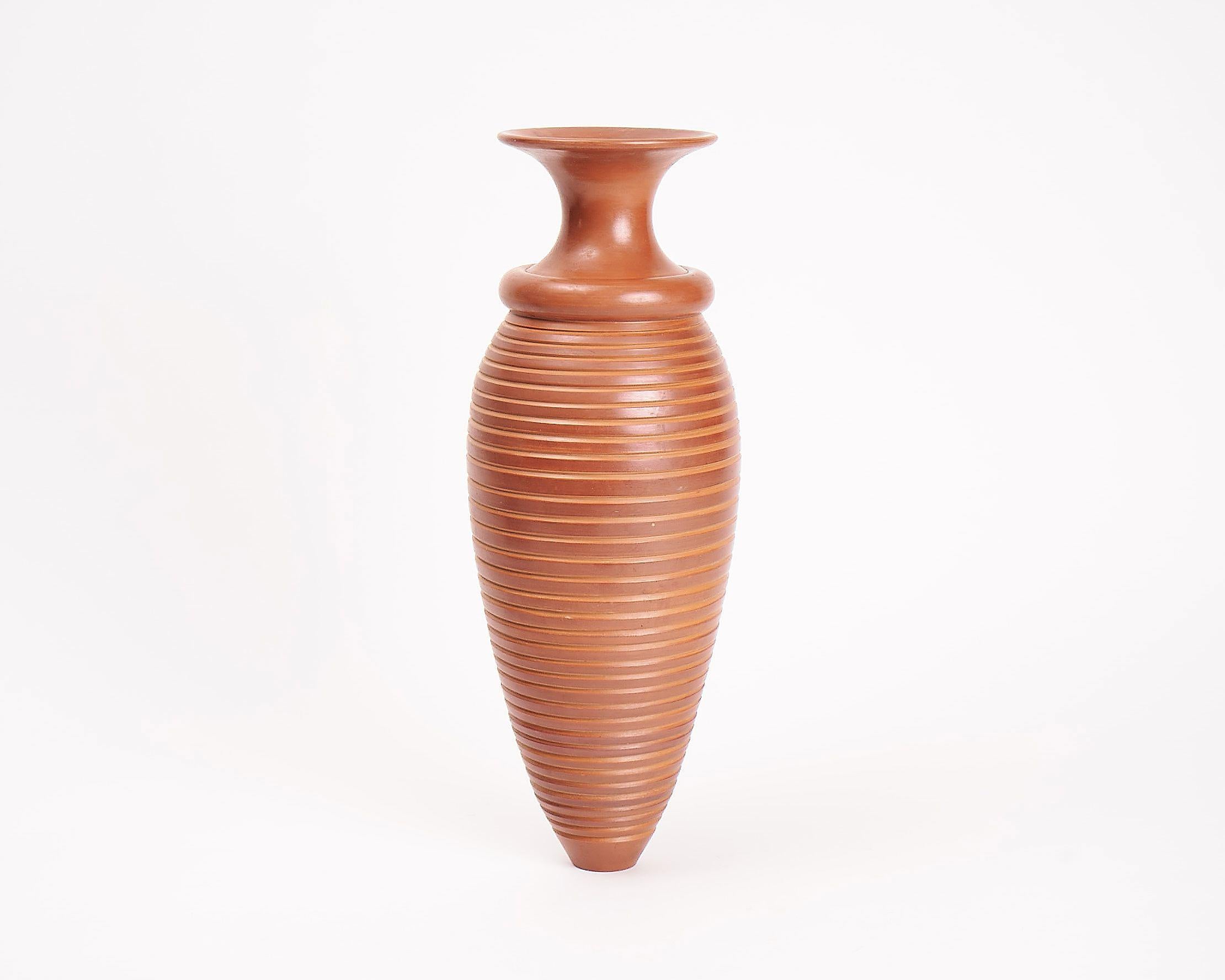 The glazed terracotta pots of Françoise Blondeau and AÏt Lhaj Hassan possess a symmetry and balance that pits their natural, earthy medium against an elegant beauty specific to man-made objects.