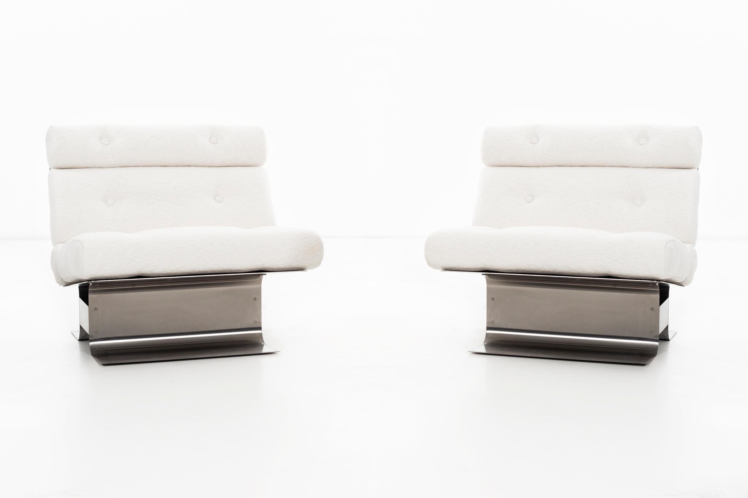 Monnet for Kappa of France, lounge chairs, sculpted stainless steel with newly upholstered seat and back in nubby wool-cotton blend by great plains.
 