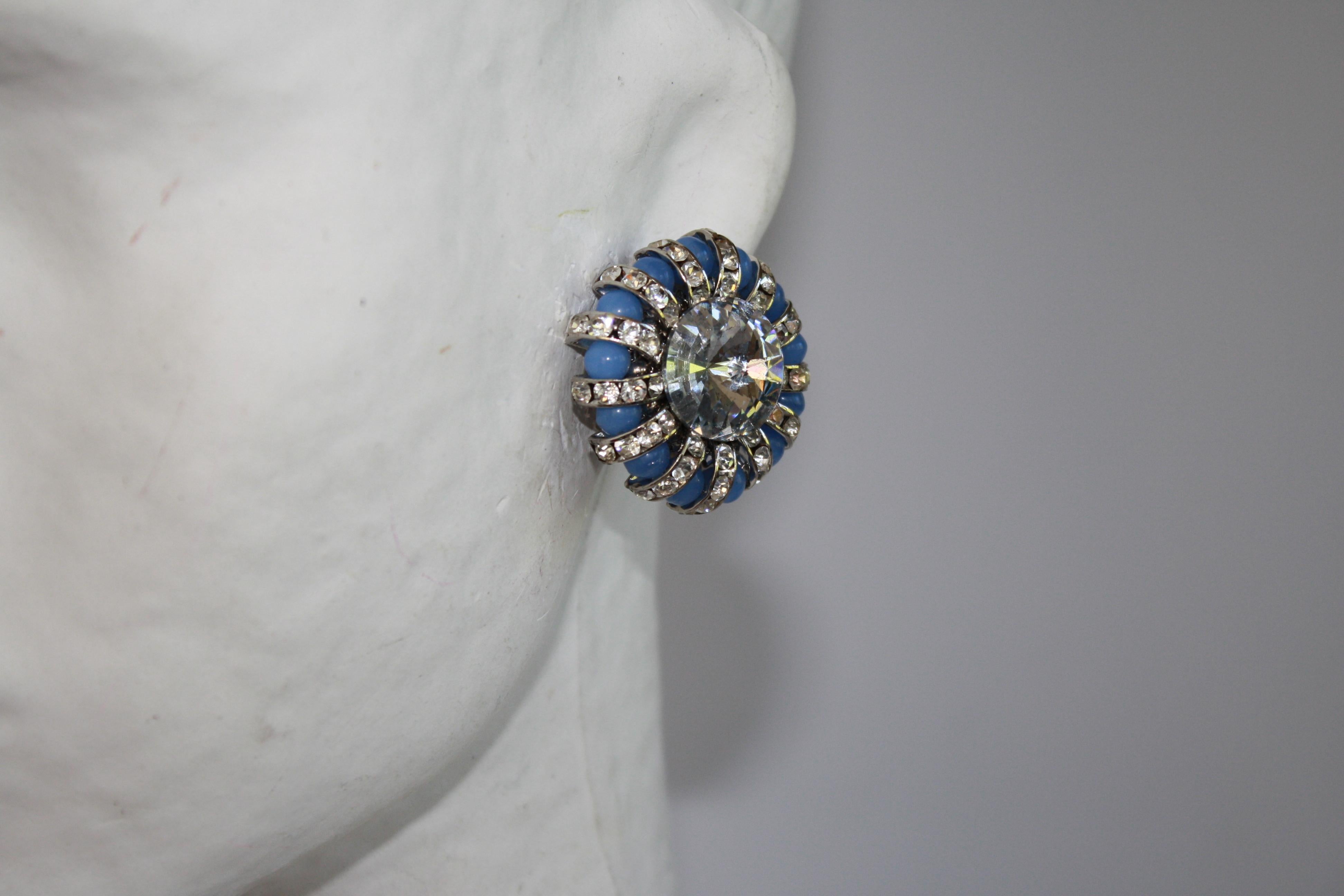 Swarovski crystal rondelles and handmade glass clip earrings from Francoise Montague.

