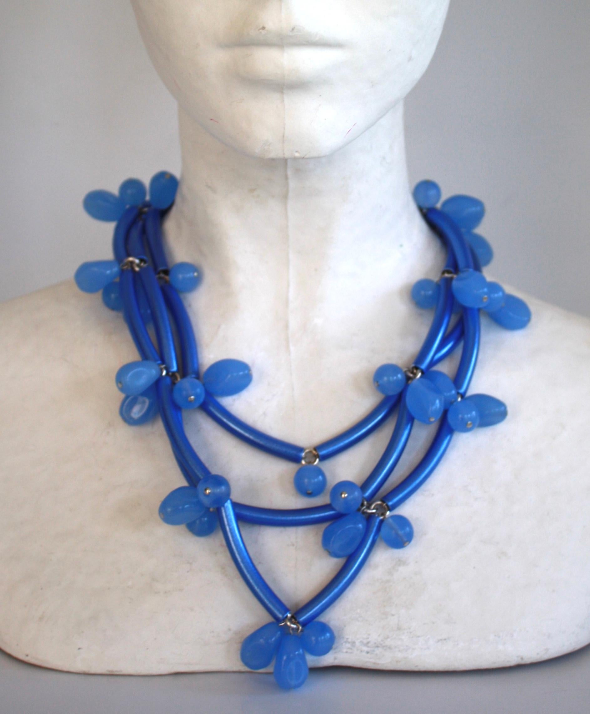 Blue tubes are mixed with vintage glass blue beads in this quintessential Francoise Montague necklace made in Paris, France. 

As seen in the book Les Paruriers, Bijoux de le Haute Couture  

16