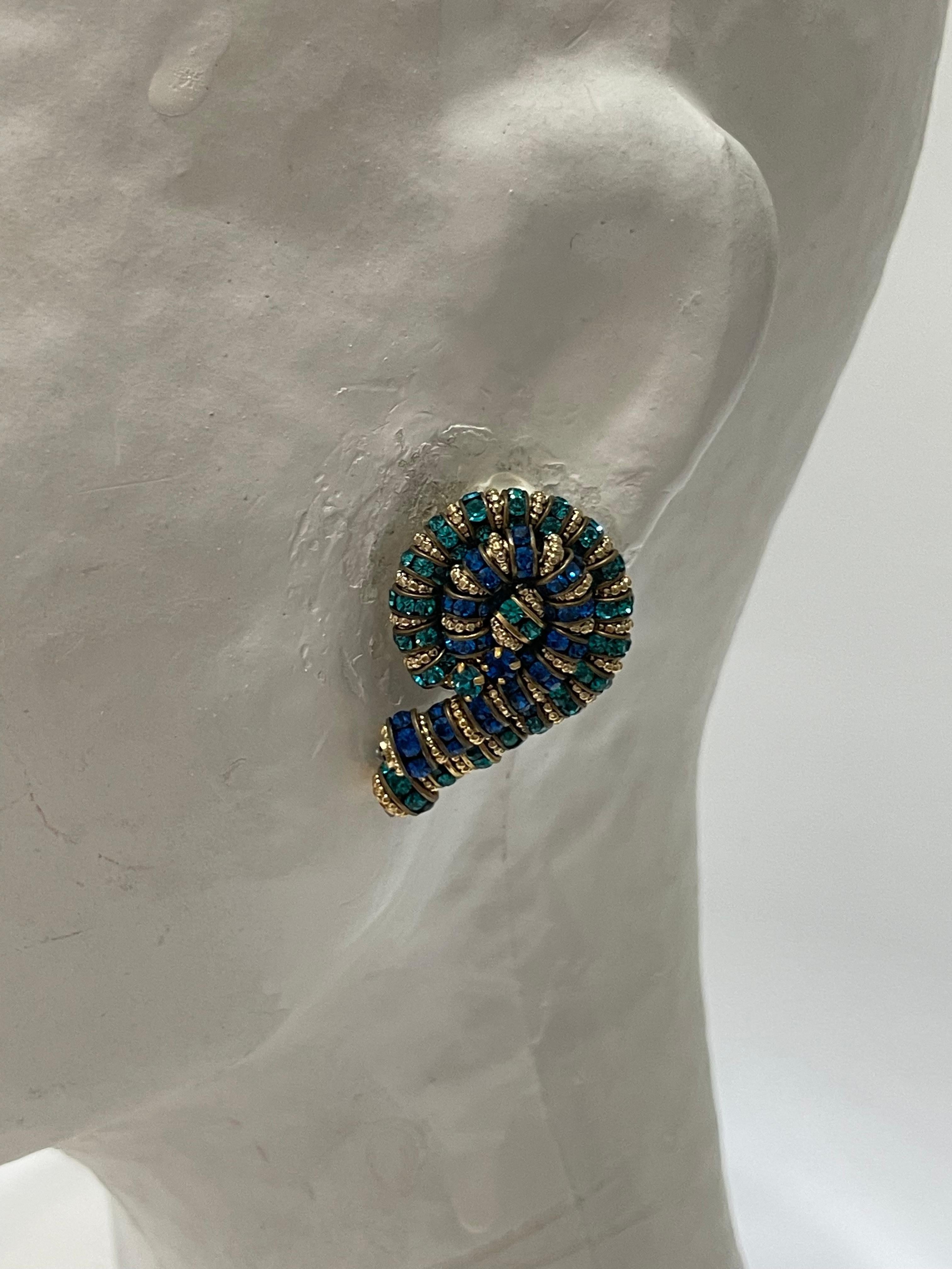 Swarovski crystals in teal and blue clip earrings. Very confortable, they fit perfectly on the ear.

Francoise Montague took over the De Saurma jewelry workshop in the late 1940s. Her mother founded the workshop in 1945, according to 