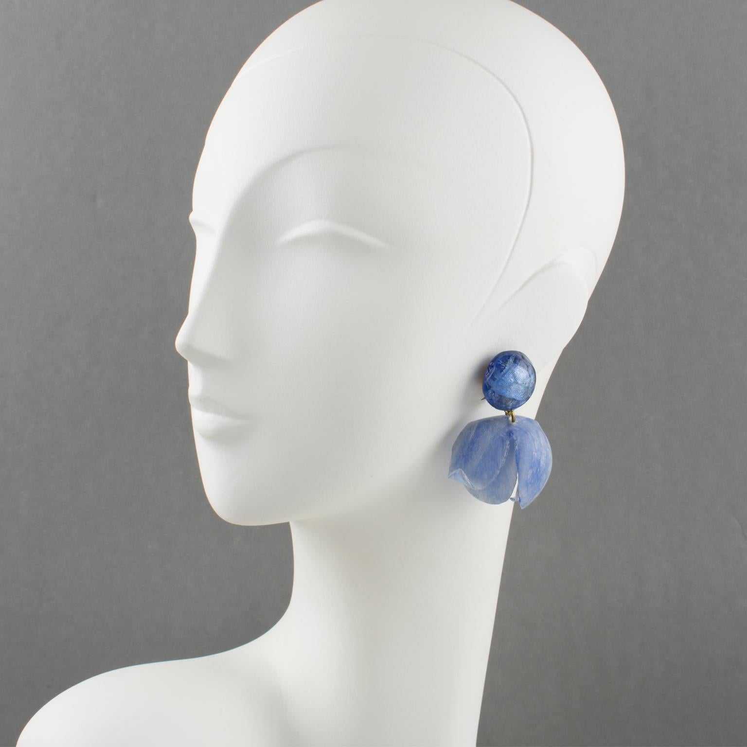 So romantic French designer Francoise Montague, Paris resin clip-on earrings, designed by Cilea Paris. Dangling shape, featuring all carved and raised flowers in silky lavender-blue color with silver foil inclusions in the fastening studs. As usual,