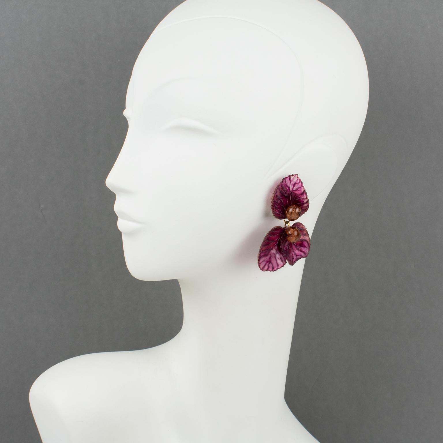 Cilea Paris created these charming resin clip-on earrings for French jewelry designer Francoise Montague. The pieces feature a dangling shape, all carved and textured, with leaves and bay fruit designs in transparent dusty pink with fuchsia pink