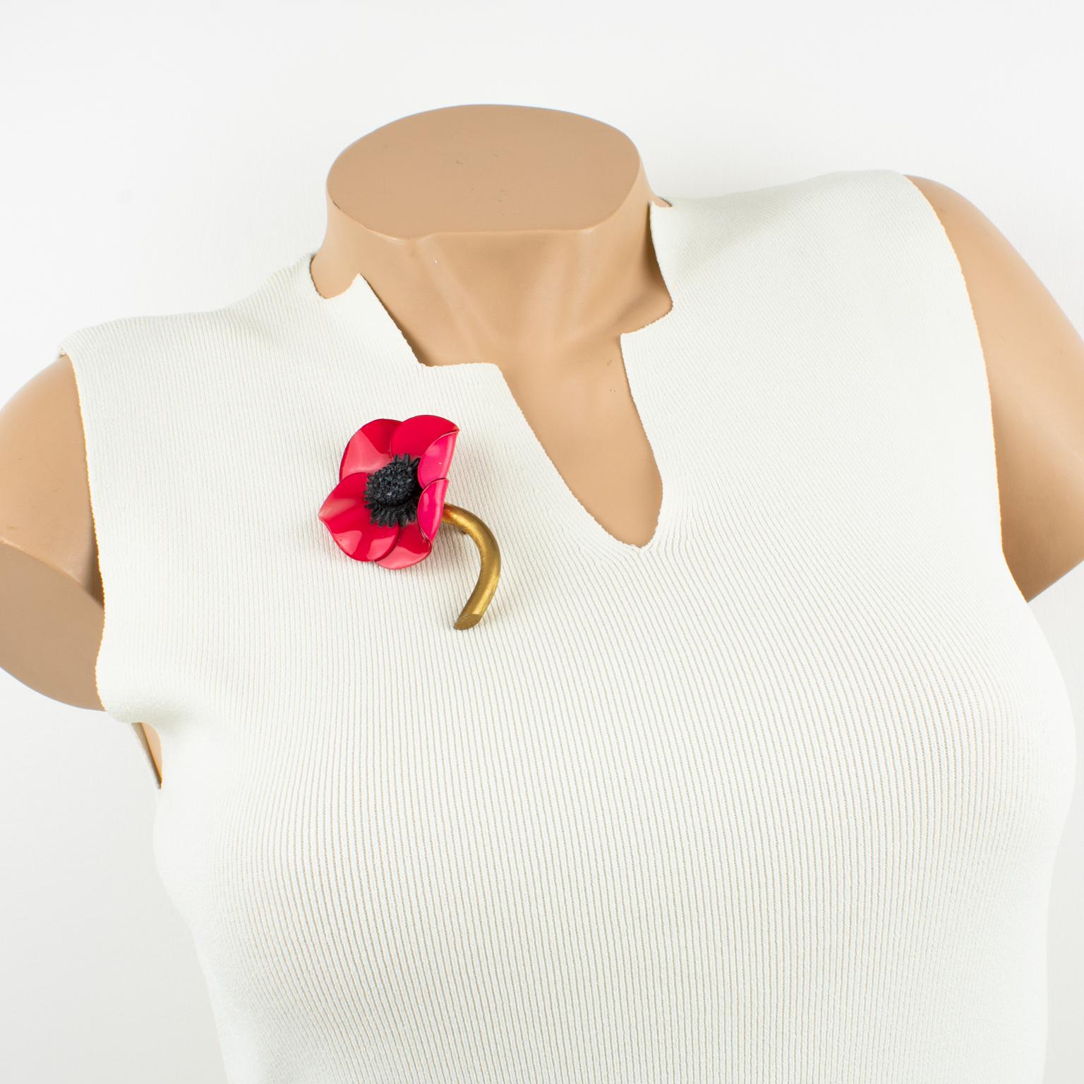 Charming dimensional pin brooch designed by Cilea Paris for French Jewelry designer Francoise Montague. Floral-inspired hand-made artisanal resin brooch featuring poppy flowers with textured patterns build together to form a powerful statement