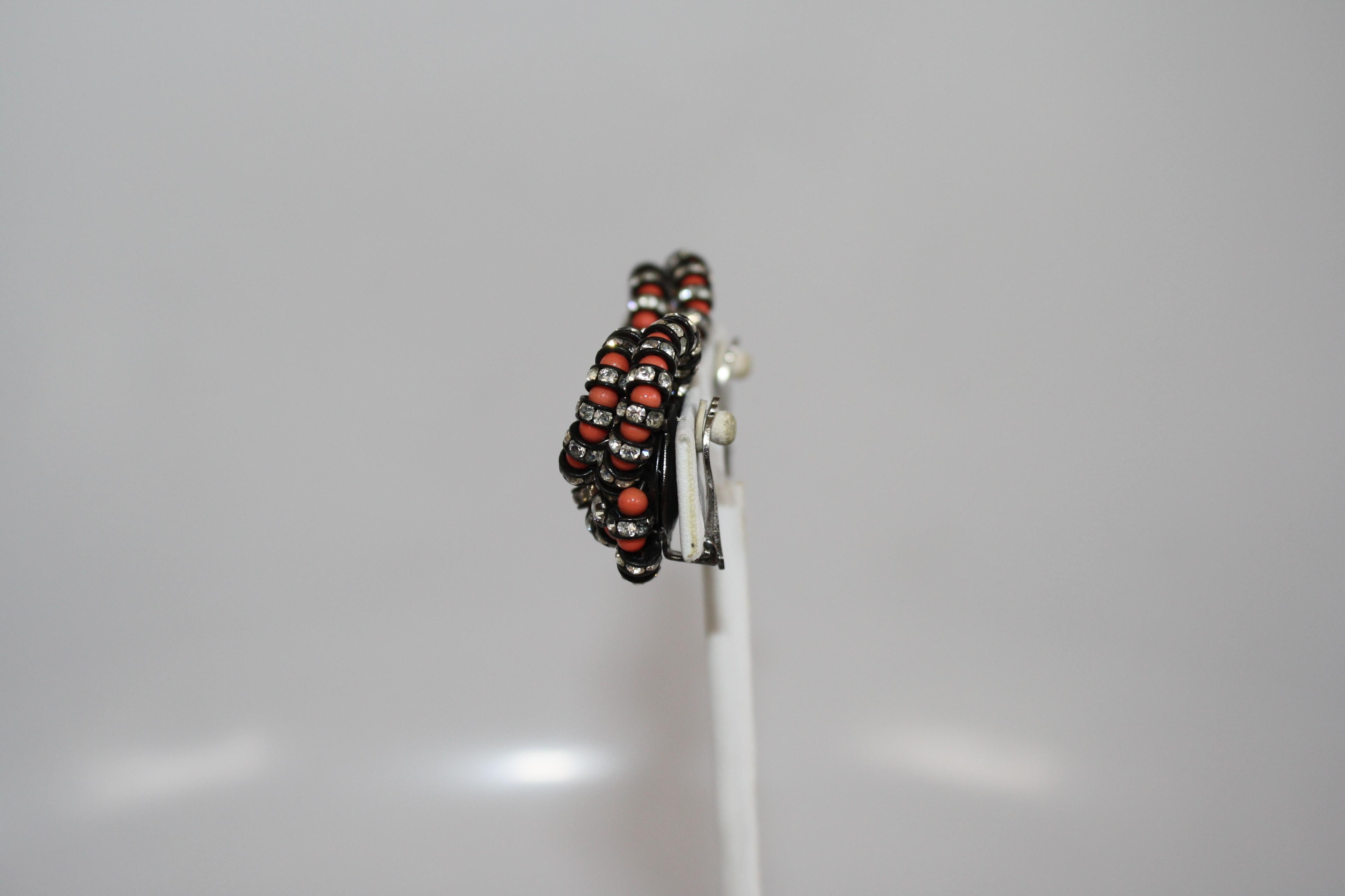 Black and coral crystal twist clip earrings from French designer Francoise Montague. 
