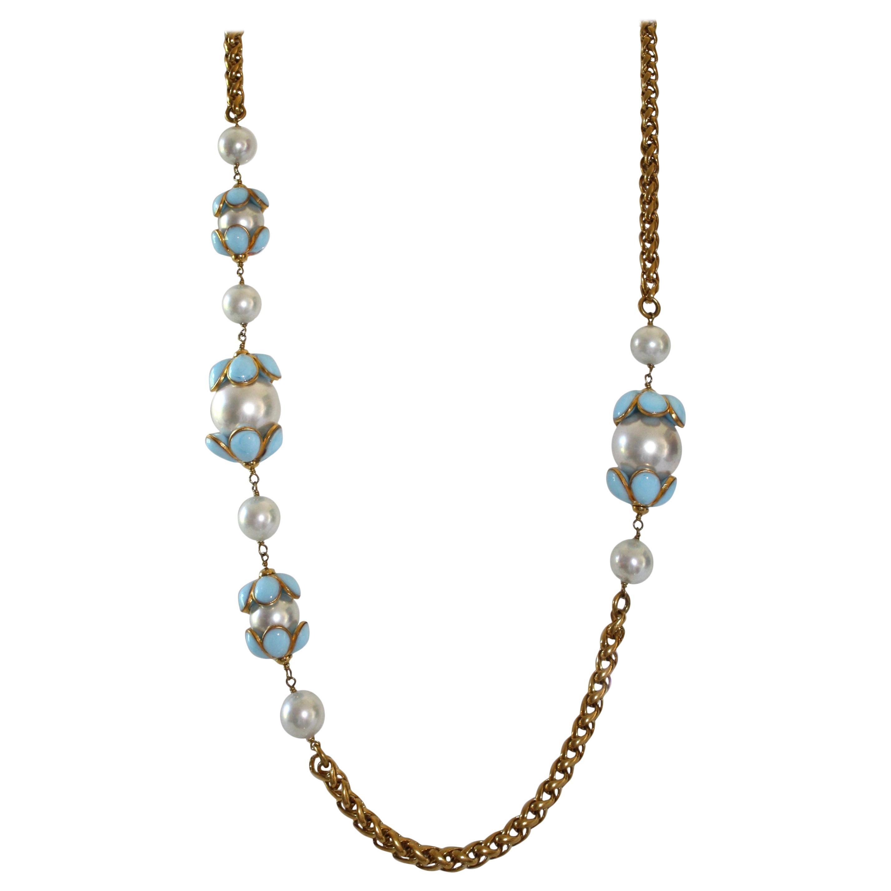 Vintage gold chain sautoir necklace with glass pearls and blue pate de verre glass flowers from Francoise Montague. 