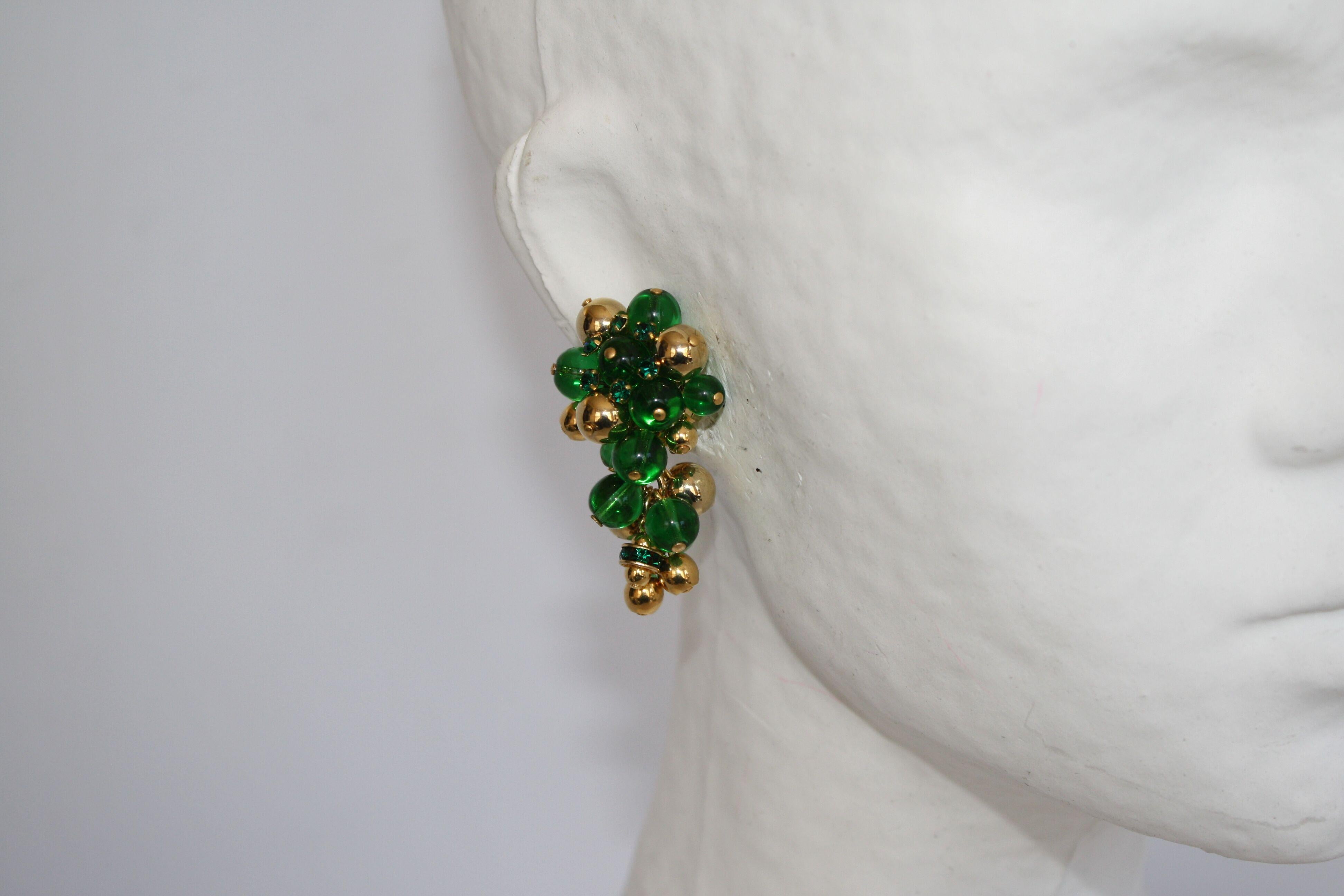 Green and gold glass clip earrings inspired after a bunch of grapes from French design house Francoise Montague. 