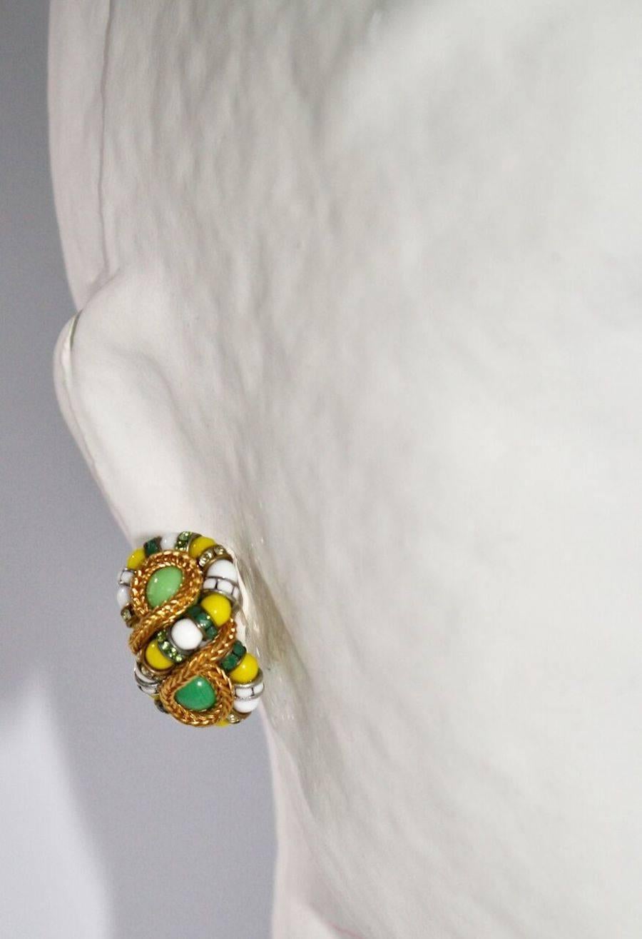 Green and yellow clip earrings in a figure 8 shape with gold chain and Swarovski crystal rondelles from Francoise Montague
